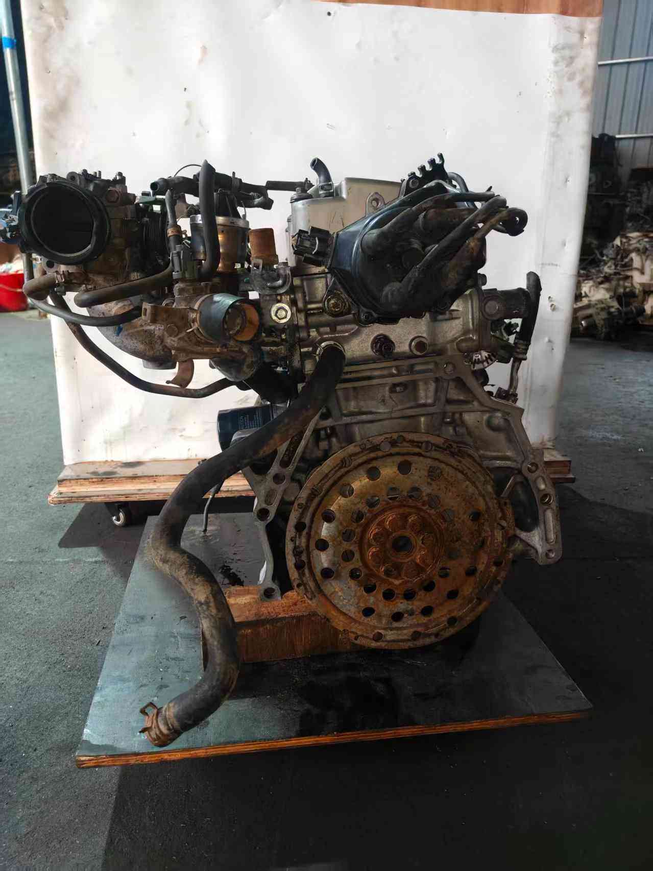 Honda F23A engine transmission side with flywheel
