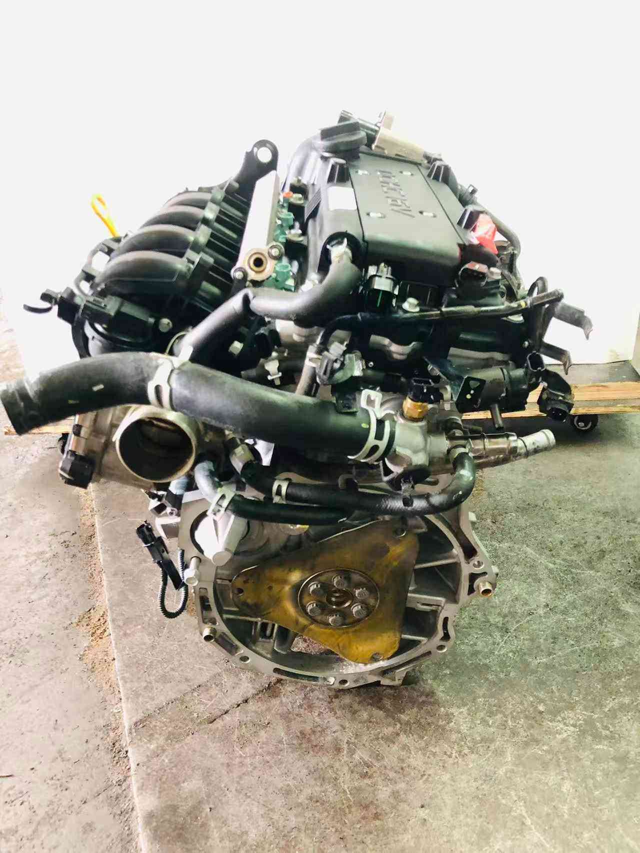 Real stock photo of used Hyundai G4FG engine assembly