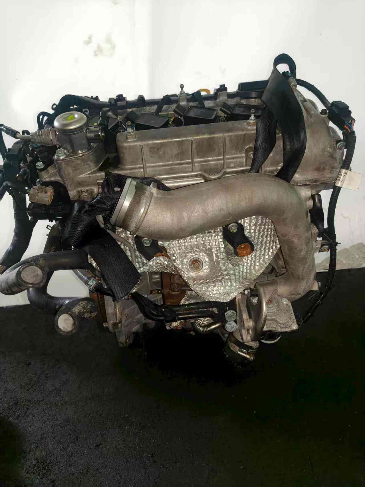 Hyundai G4FJ turbo engine side view with original components