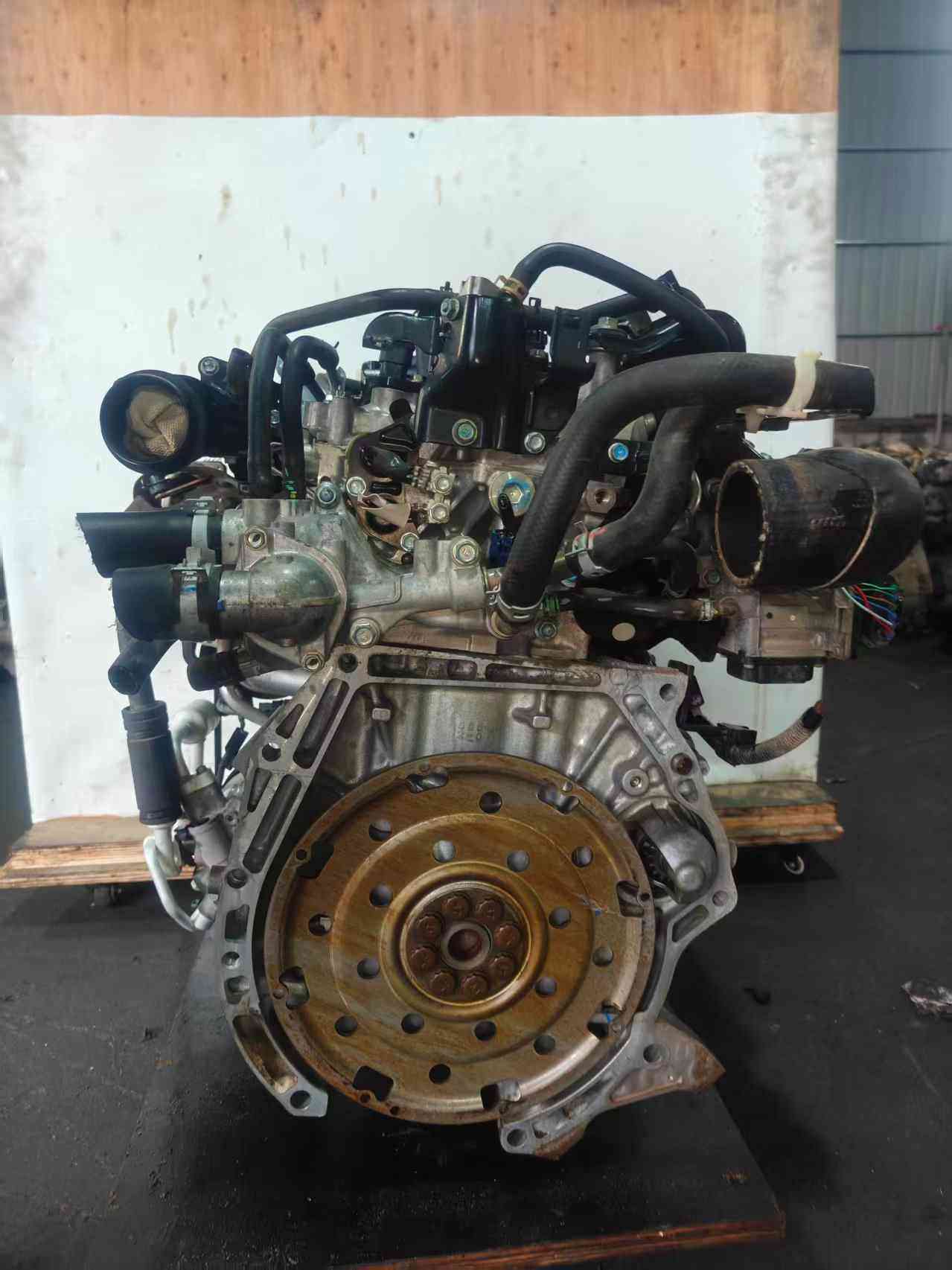 L15B8 engine transmission side with flywheel housing