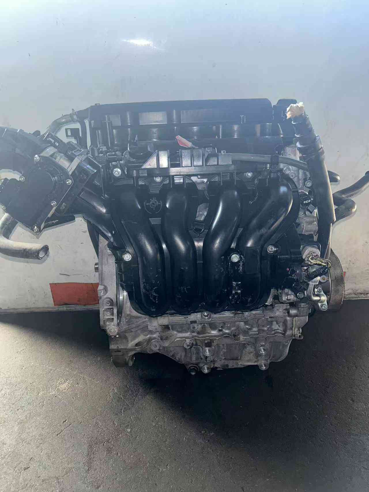 Honda R18A1 used engine intake manifold side view