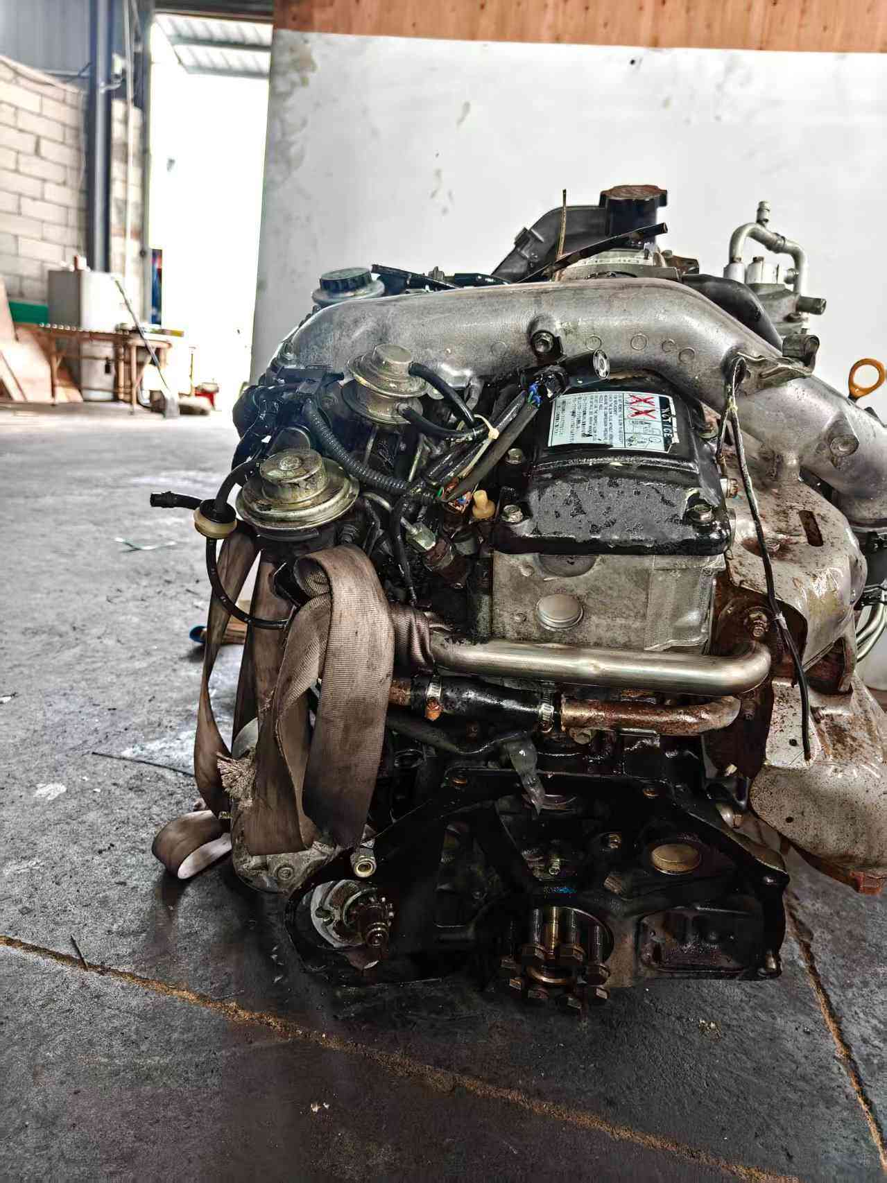 Real stock photo of used Toyota 1KZ-TE engine assembly