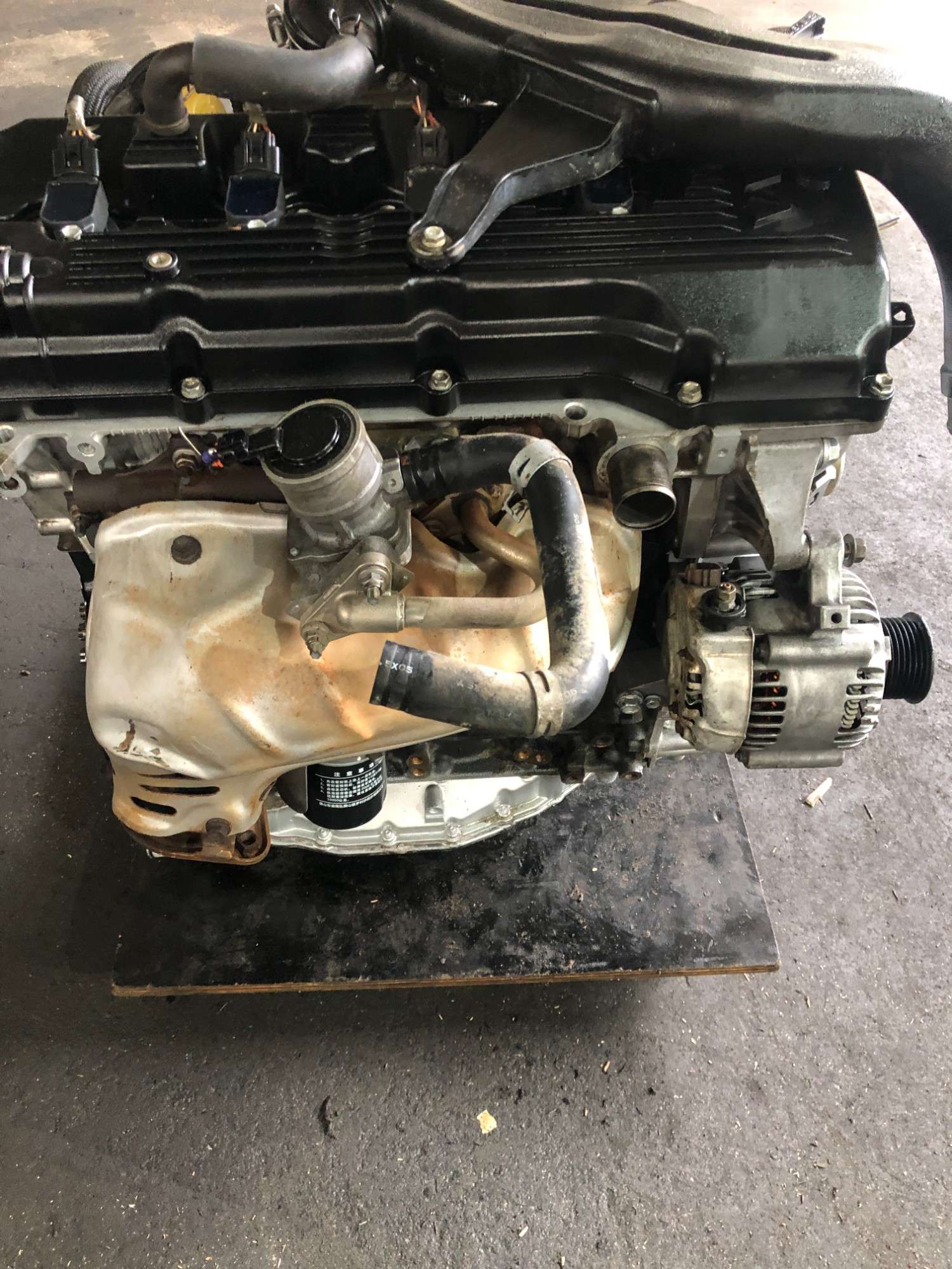 Toyota 2TR-FE engine side view with original components