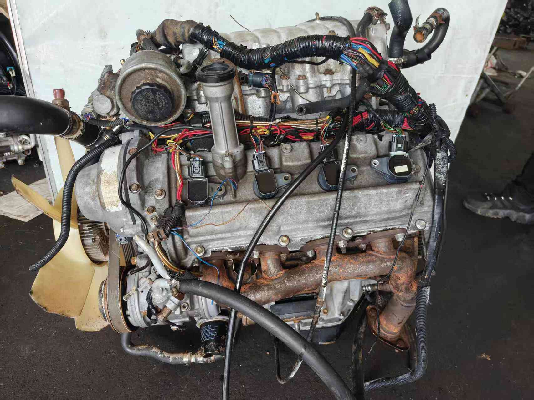 Toyota 2UZ-FE V8 engine side view with original components