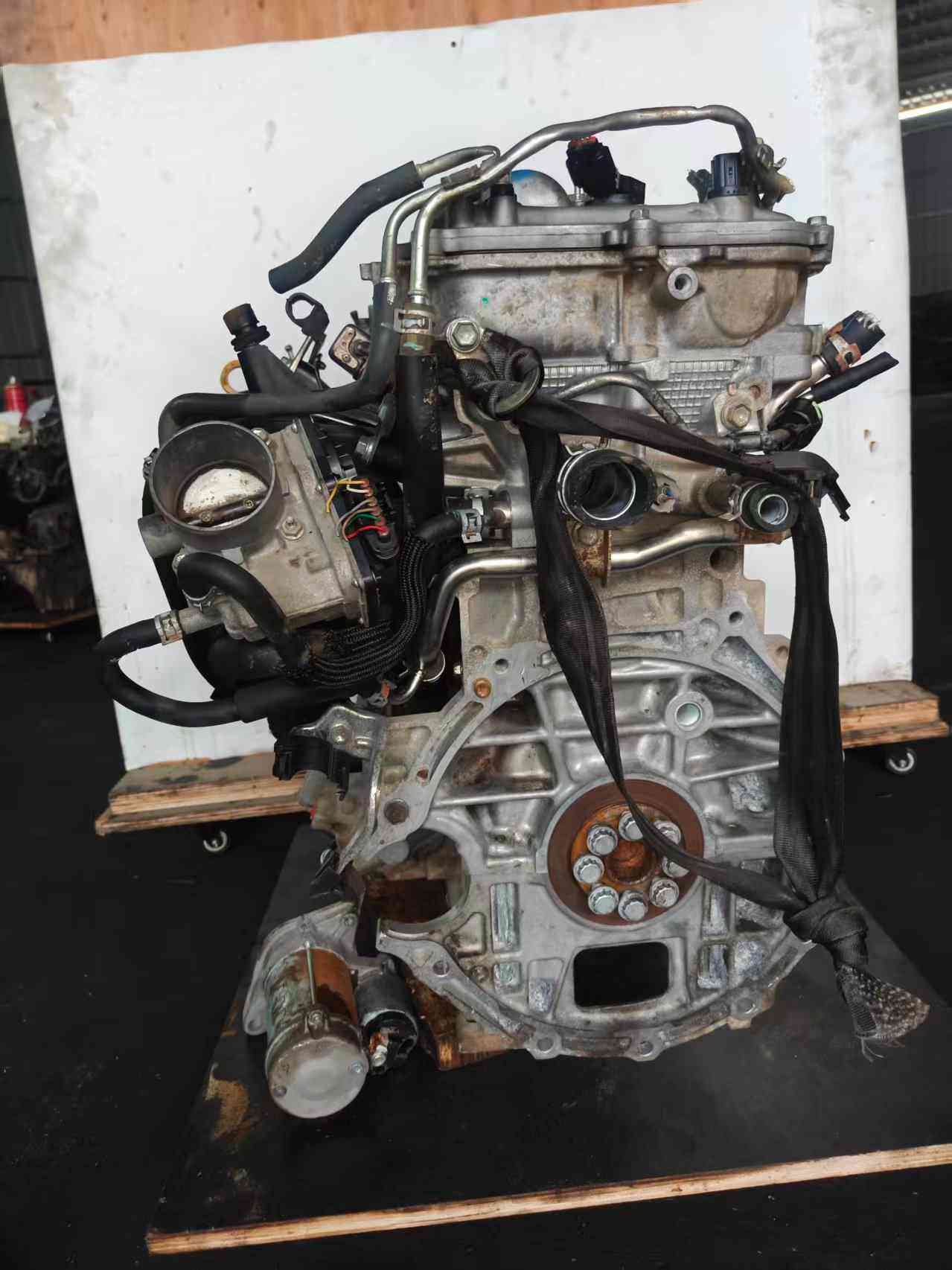 Toyota 2ZR-FE engine side view with original components