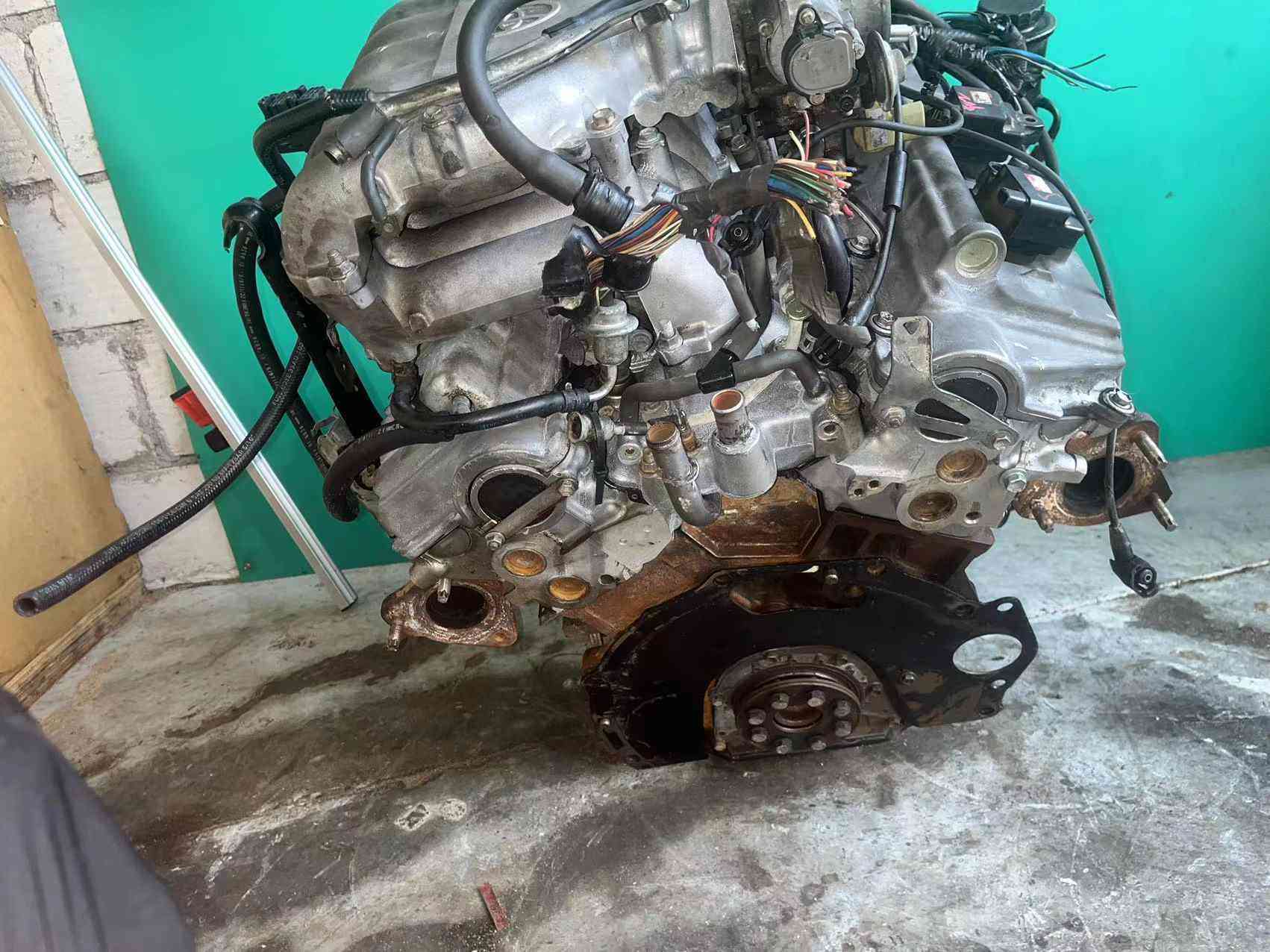 Real stock photo of used Toyota 5VZ-FE engine assembly for sale