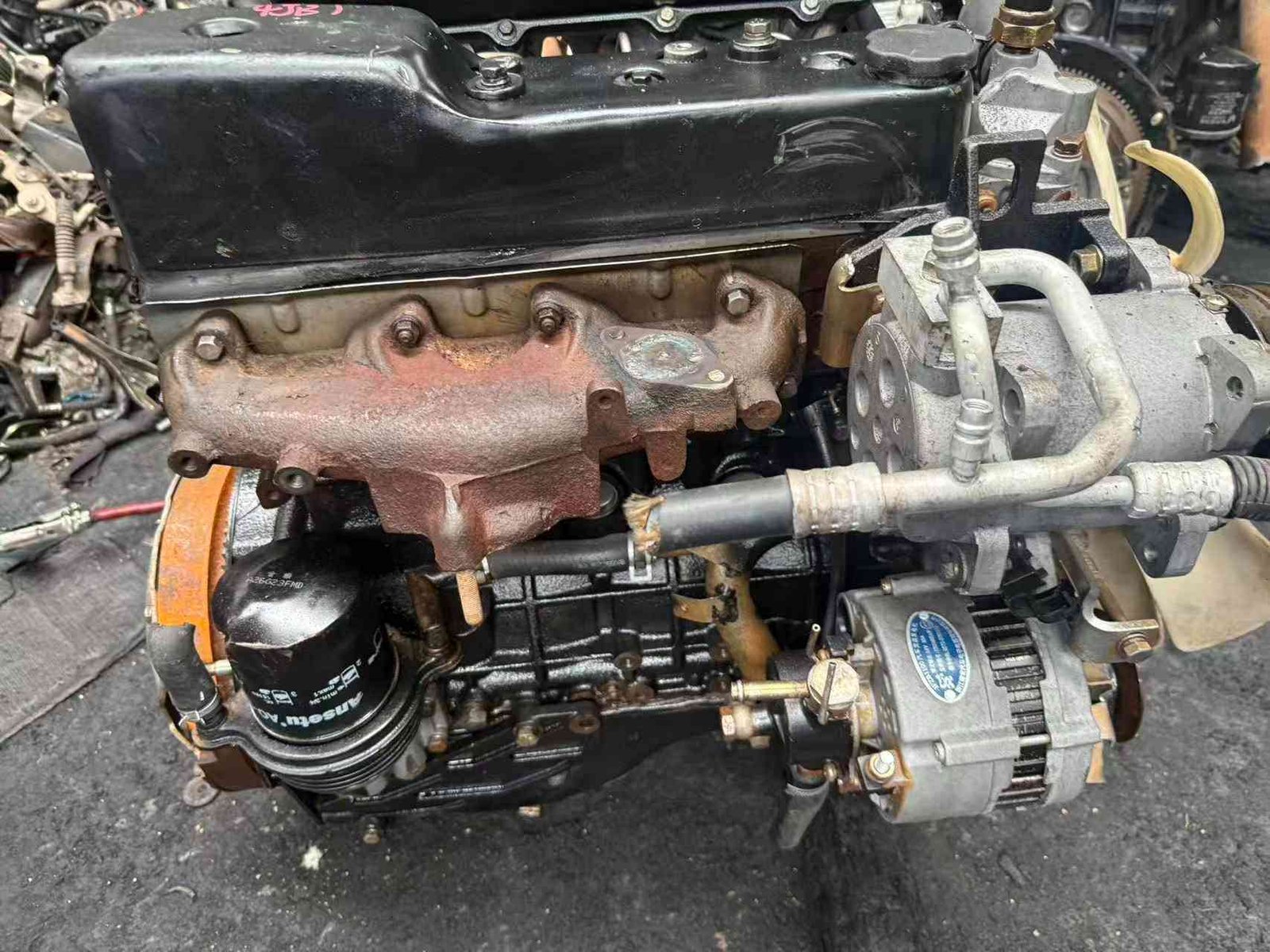 Isuzu 4JB1 diesel engine fuel injection pump side with high pressure lines