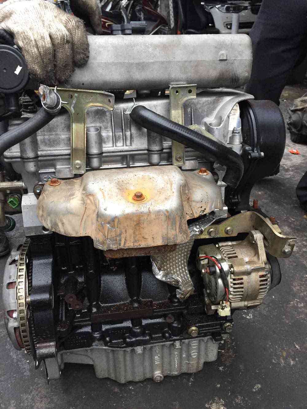 Automotive replacement engine motor identified by Chery code SQR473F