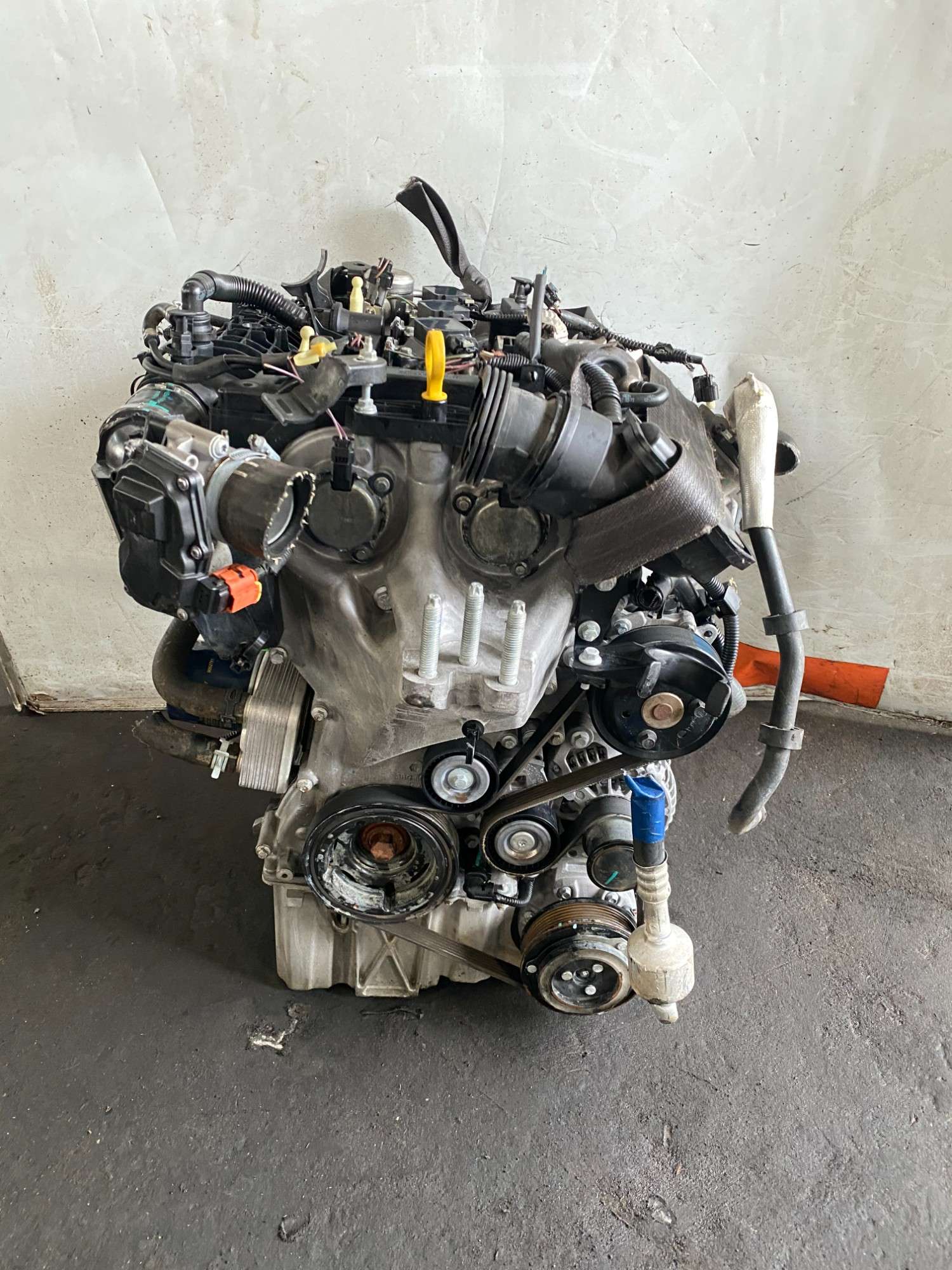 Ford 1.0 EcoBoost engine front view with timing cover and pulleys