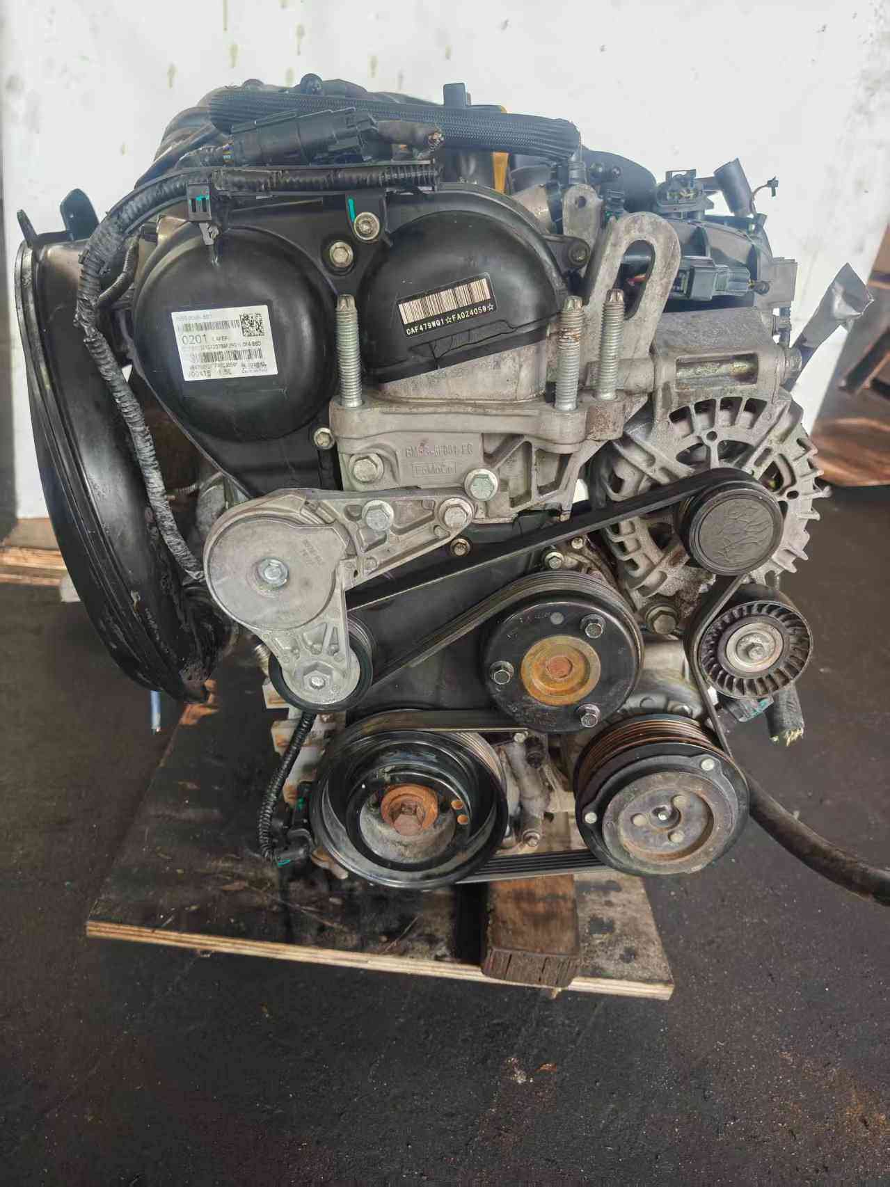 Ford 1.5 EcoBoost engine front view with timing belt cover and alternator