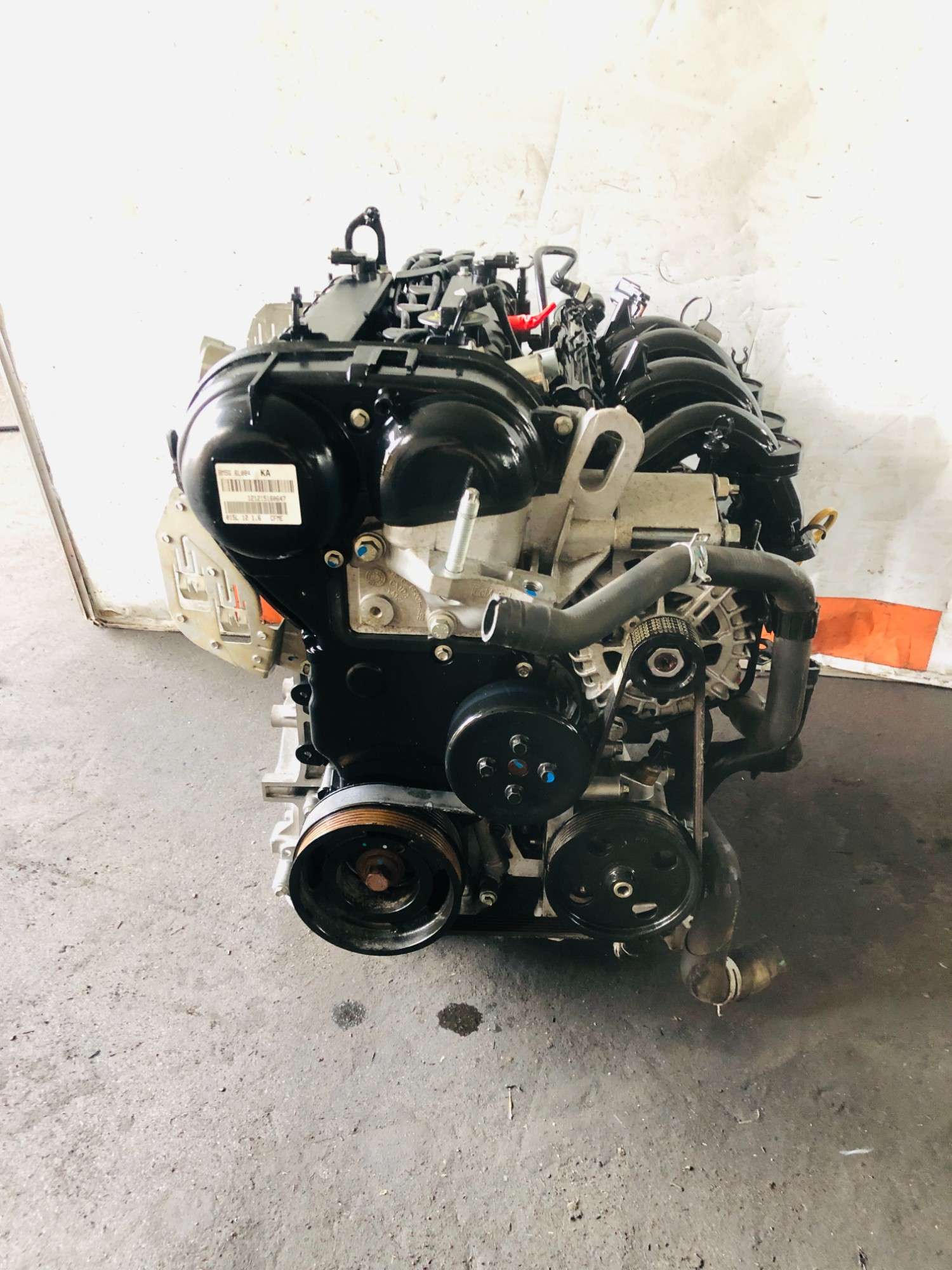 Ford 1.6 Duratec engine front view with timing cover and belt pulleys