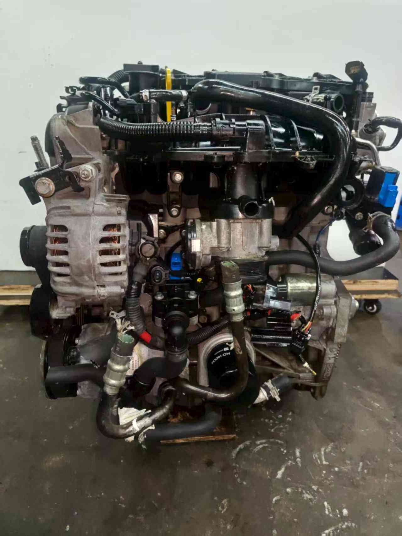 Ford 1.6 EcoBoost engine intake manifold side with alternator and turbo piping