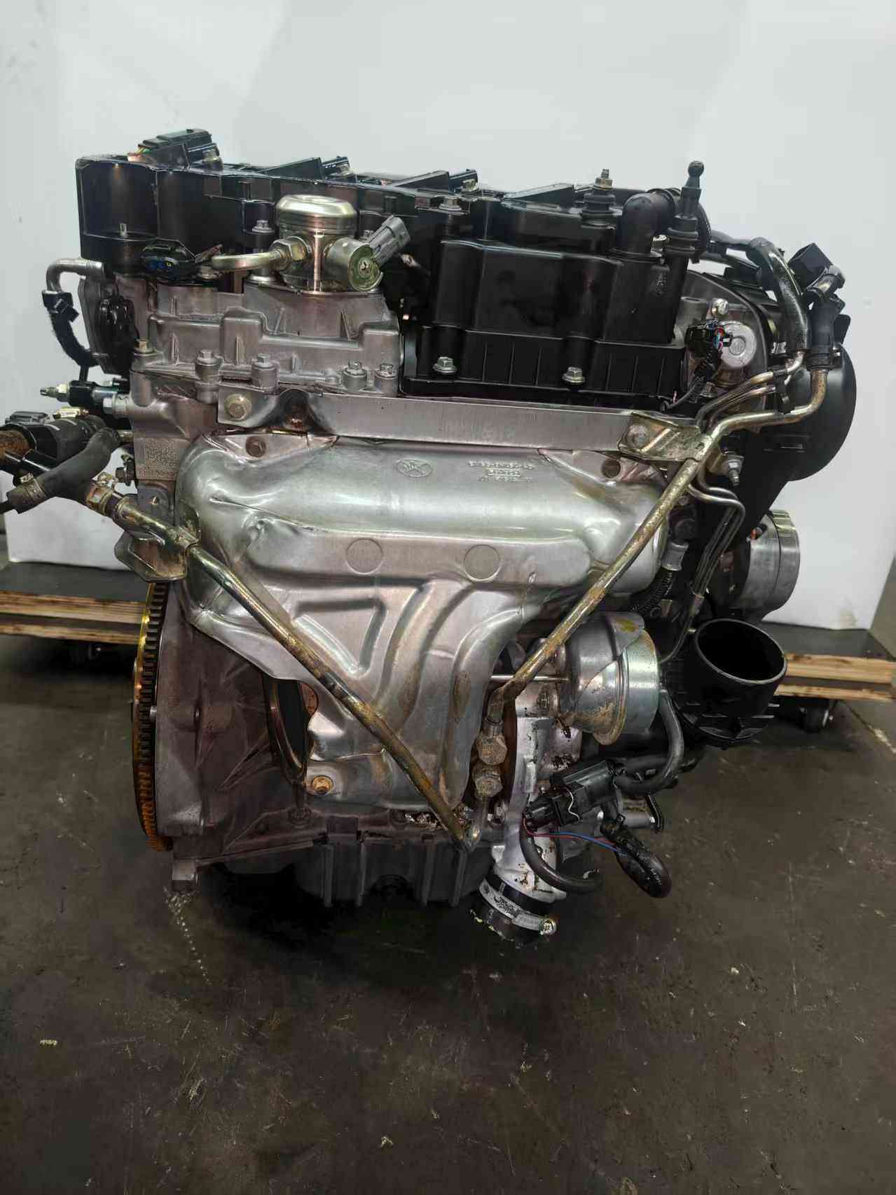 Ford 1.6 EcoBoost engine turbocharger side with exhaust manifold heat shield