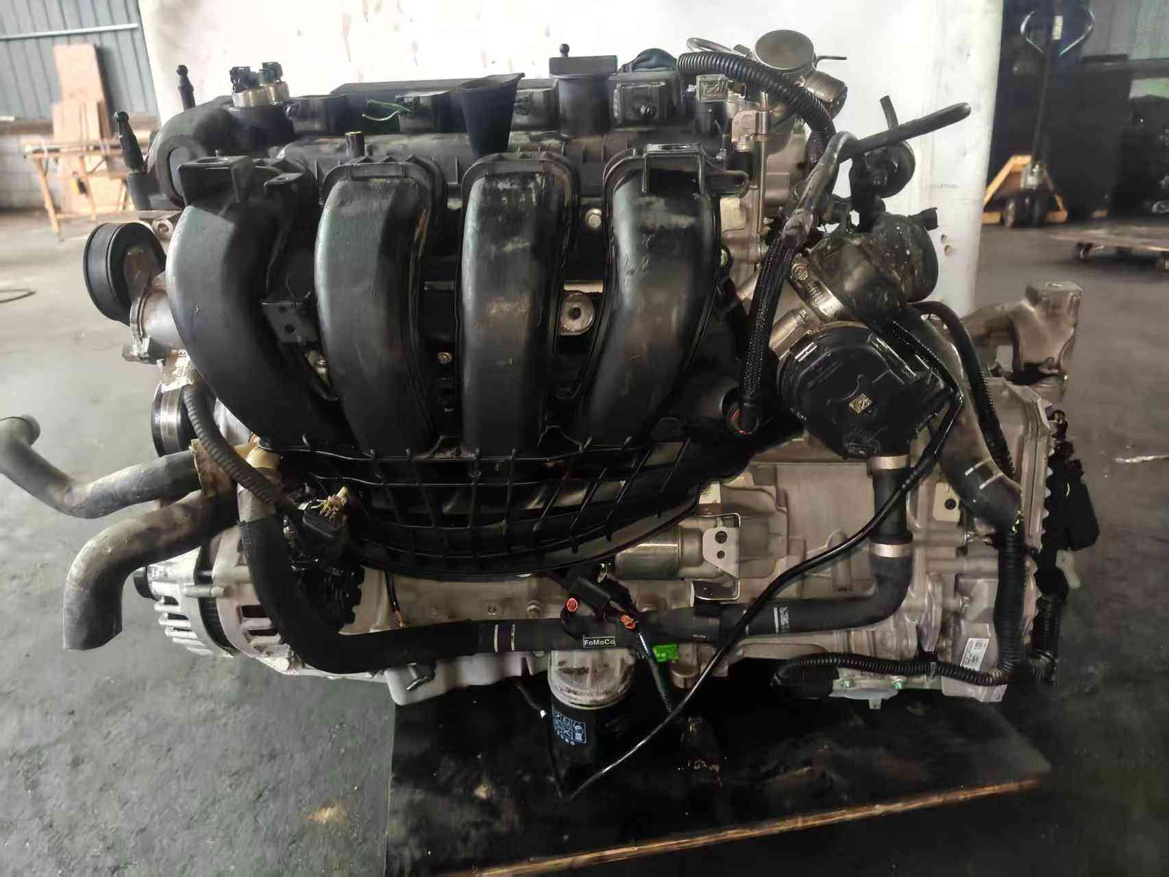 Ford 2.0 Duratec engine intake manifold side with alternator and oil filter
