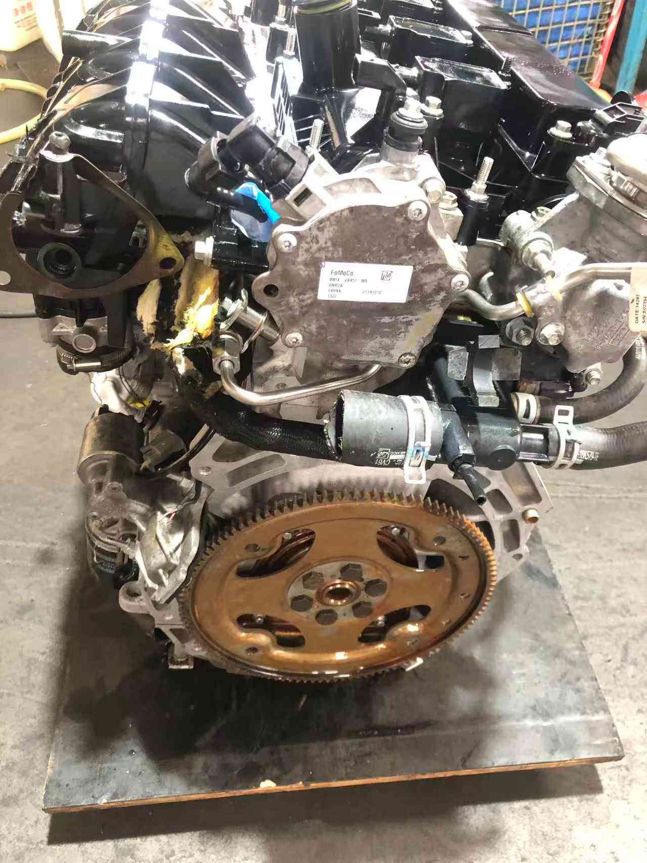 Ford 2.0 EcoBoost engine flywheel side with vacuum pump and intake manifold
