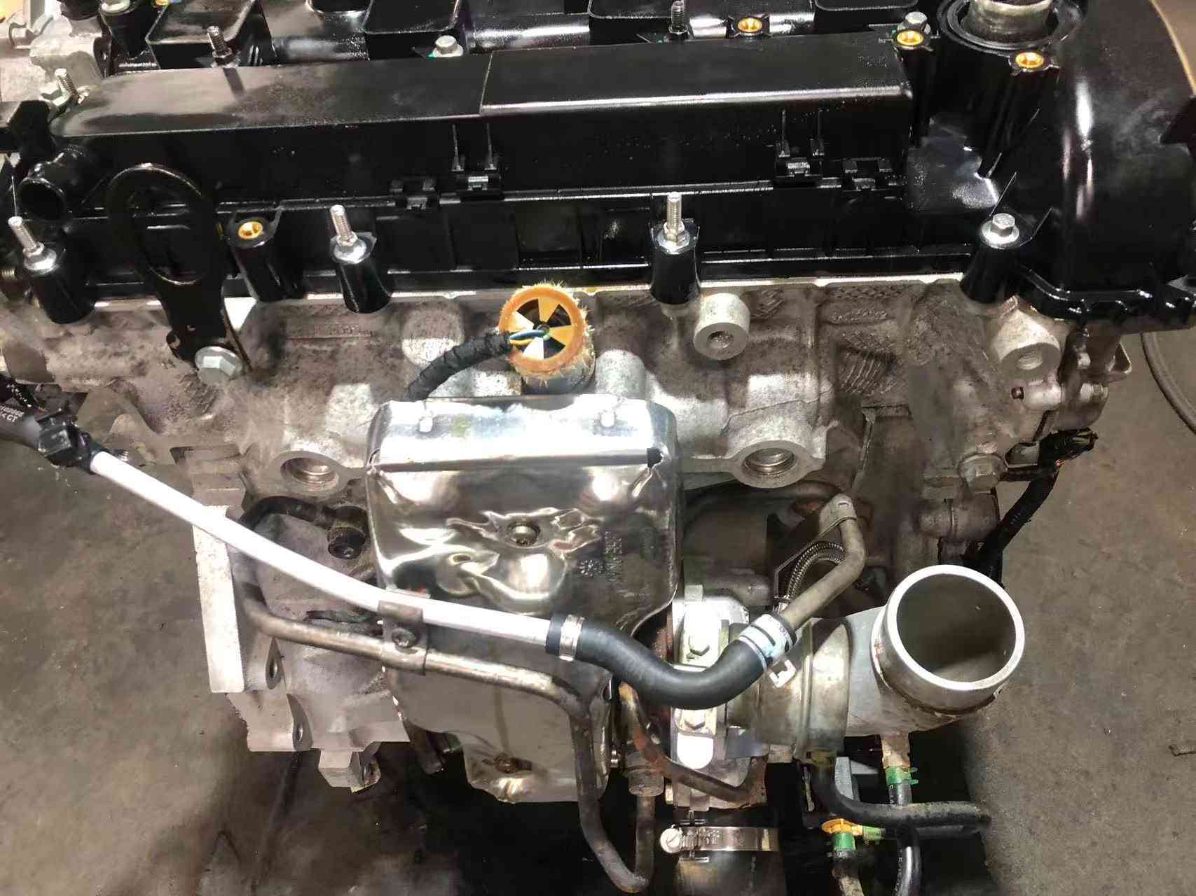 Ford 2.0 EcoBoost engine turbocharger side with exhaust manifold heat shield