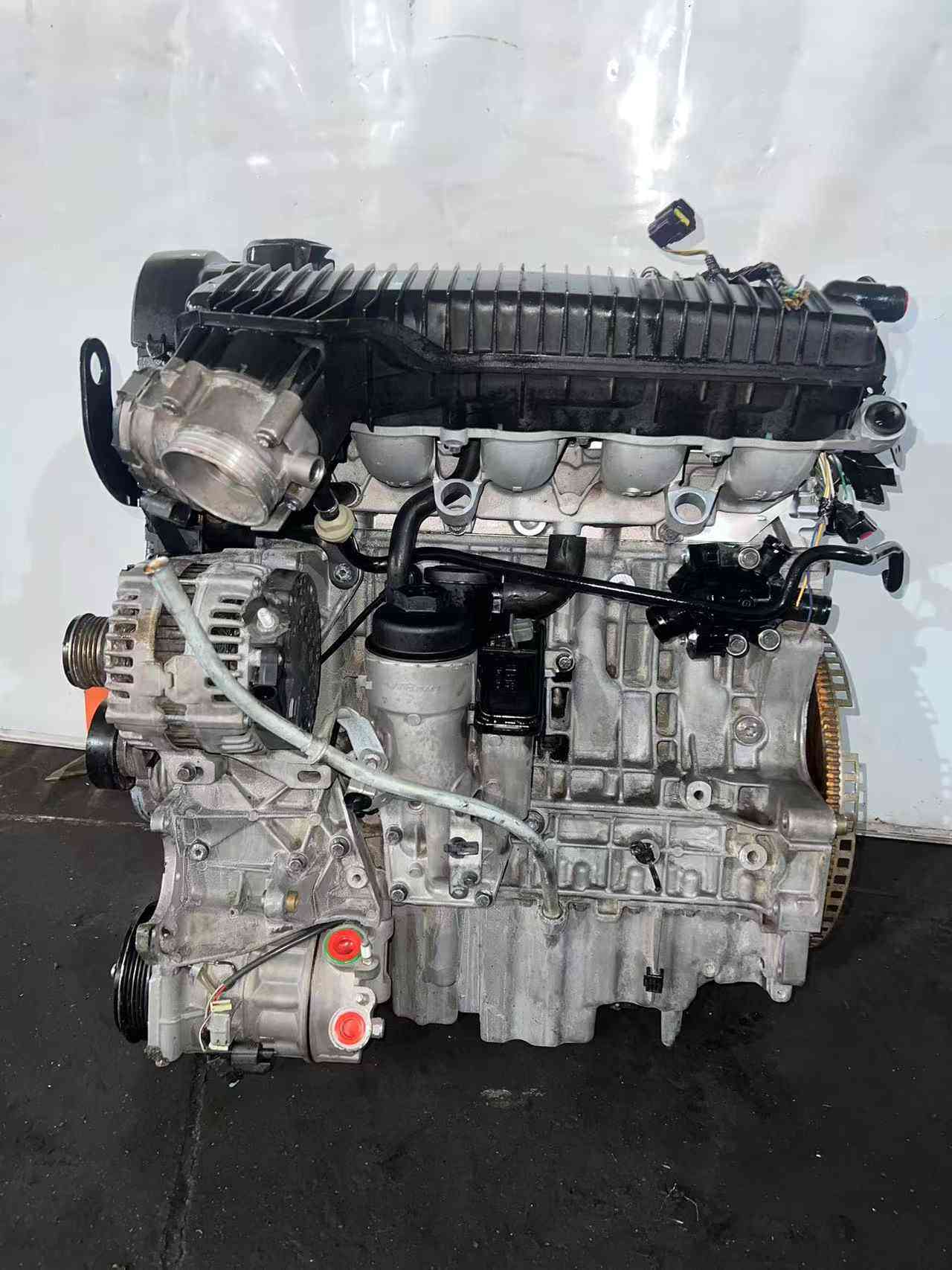 Ford 2.5 EcoBoost engine intake manifold side with throttle body and alternator