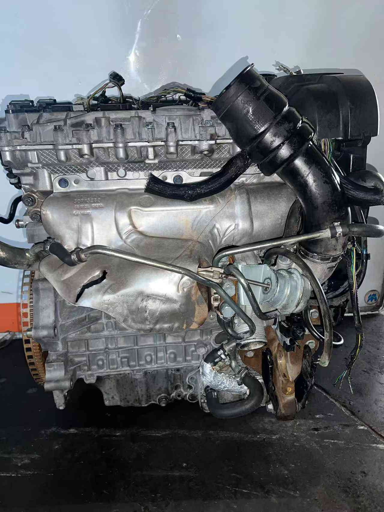 Ford 2.5 EcoBoost engine turbocharger side with exhaust manifold and piping