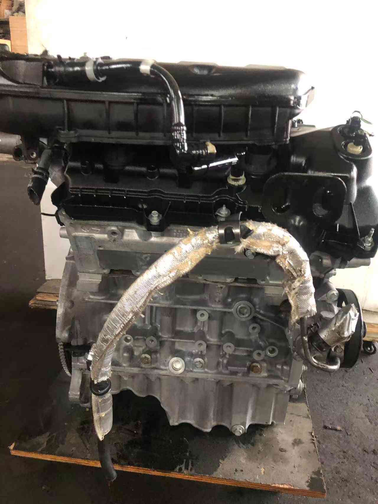 Ford 3.5 Duratec V6 engine exhaust side with manifold heat shield and oil pan