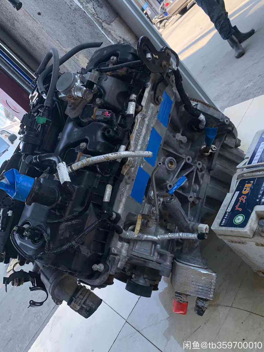 Ford 3.5 EcoBoost V6 engine intake side with throttle body and belt pulleys