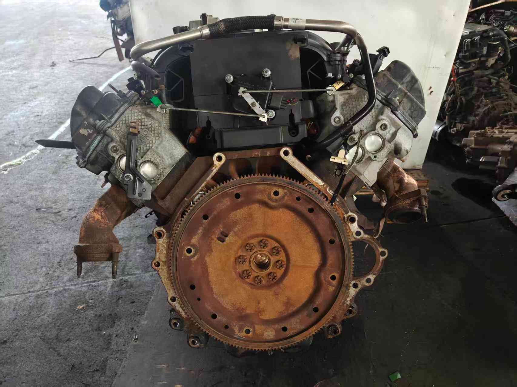 Ford 5.4 Duratec V8 engine flywheel side with large flexplate and exhaust manifolds