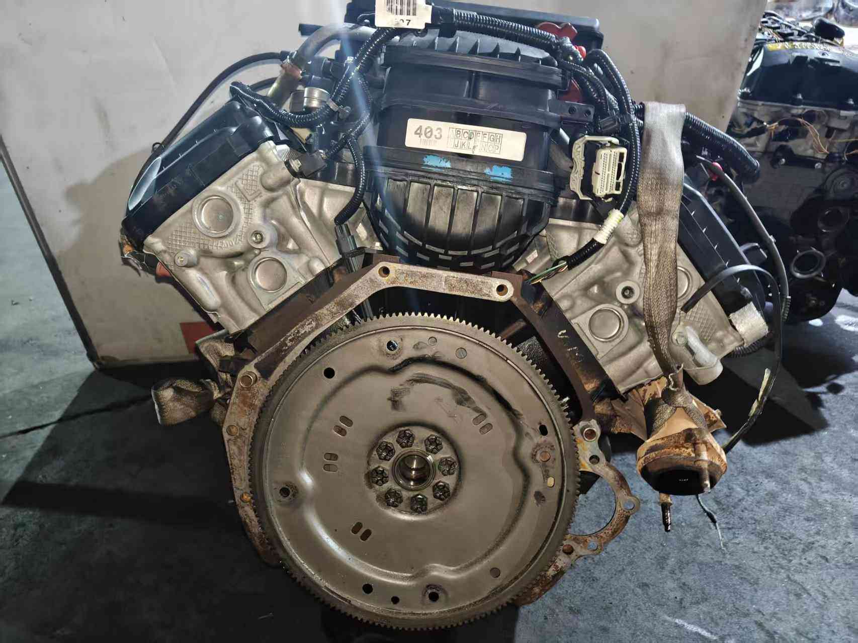 Ford 6.2 Duratec V8 engine flywheel side with flexplate and throttle body