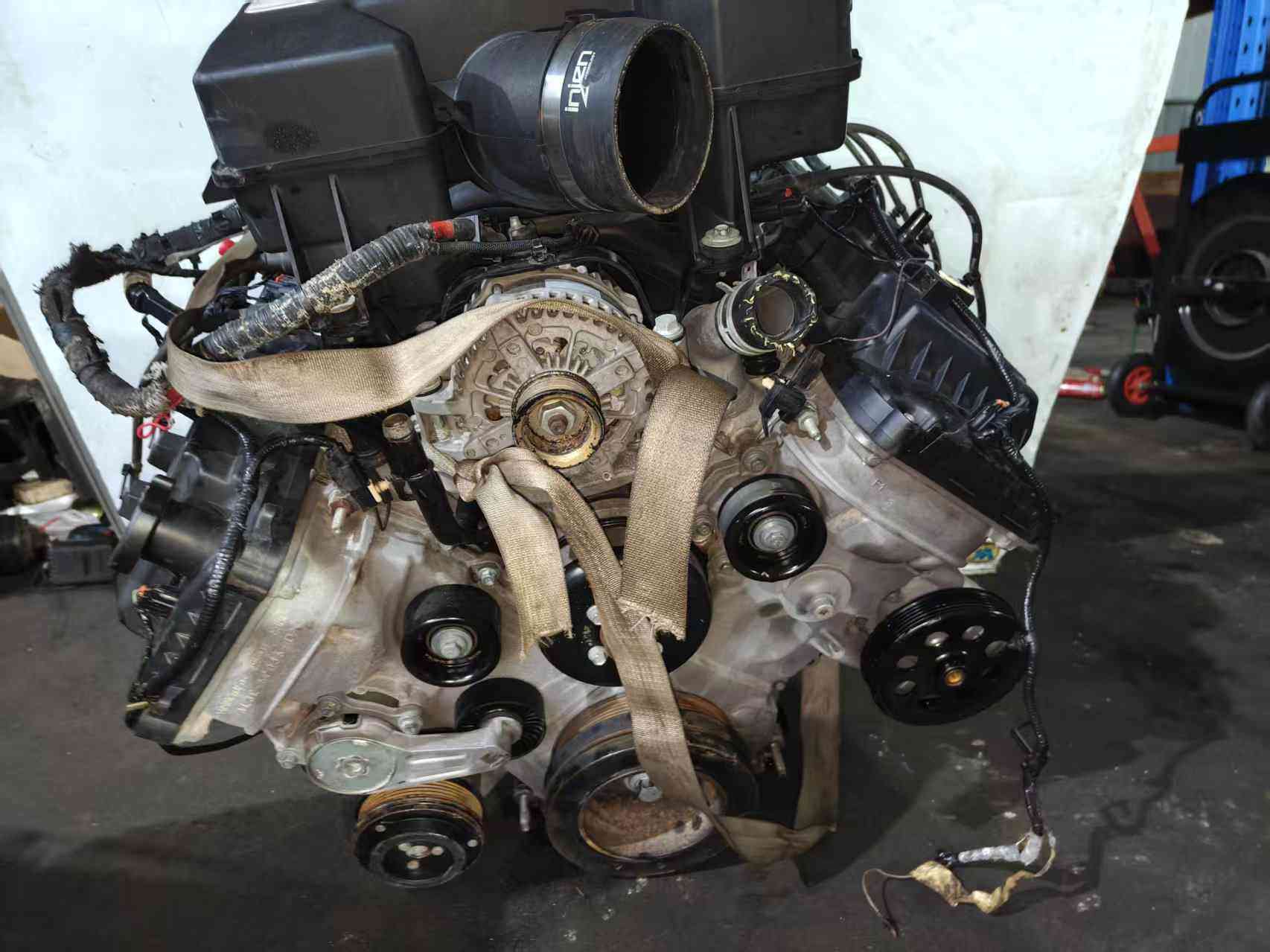 Ford 6.2 Duratec V8 engine front view with alternator and air intake assembly