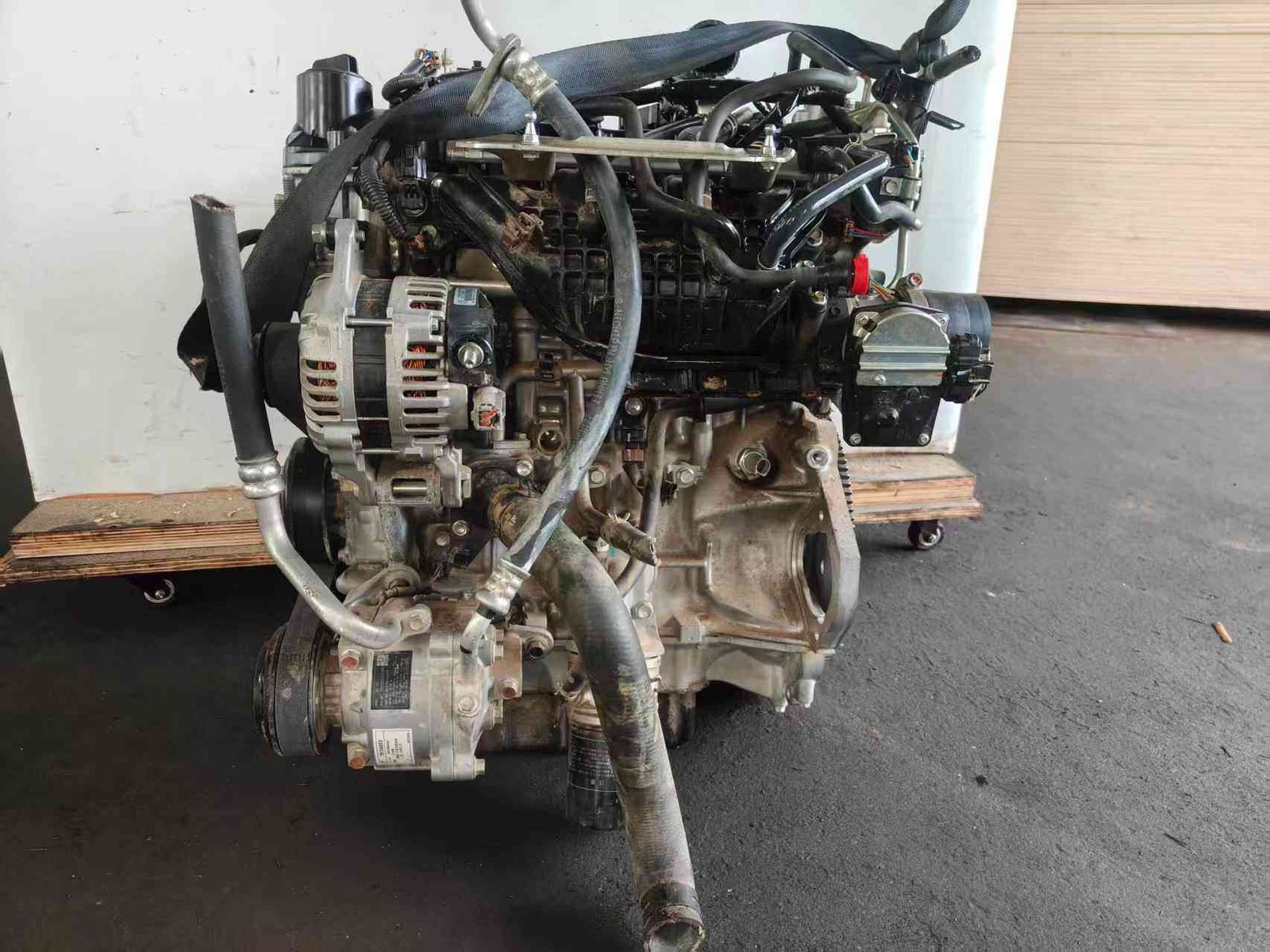 Close-up of the Mitsubishi 4B40 MIVEC Turbo engine assembly with all accessories.