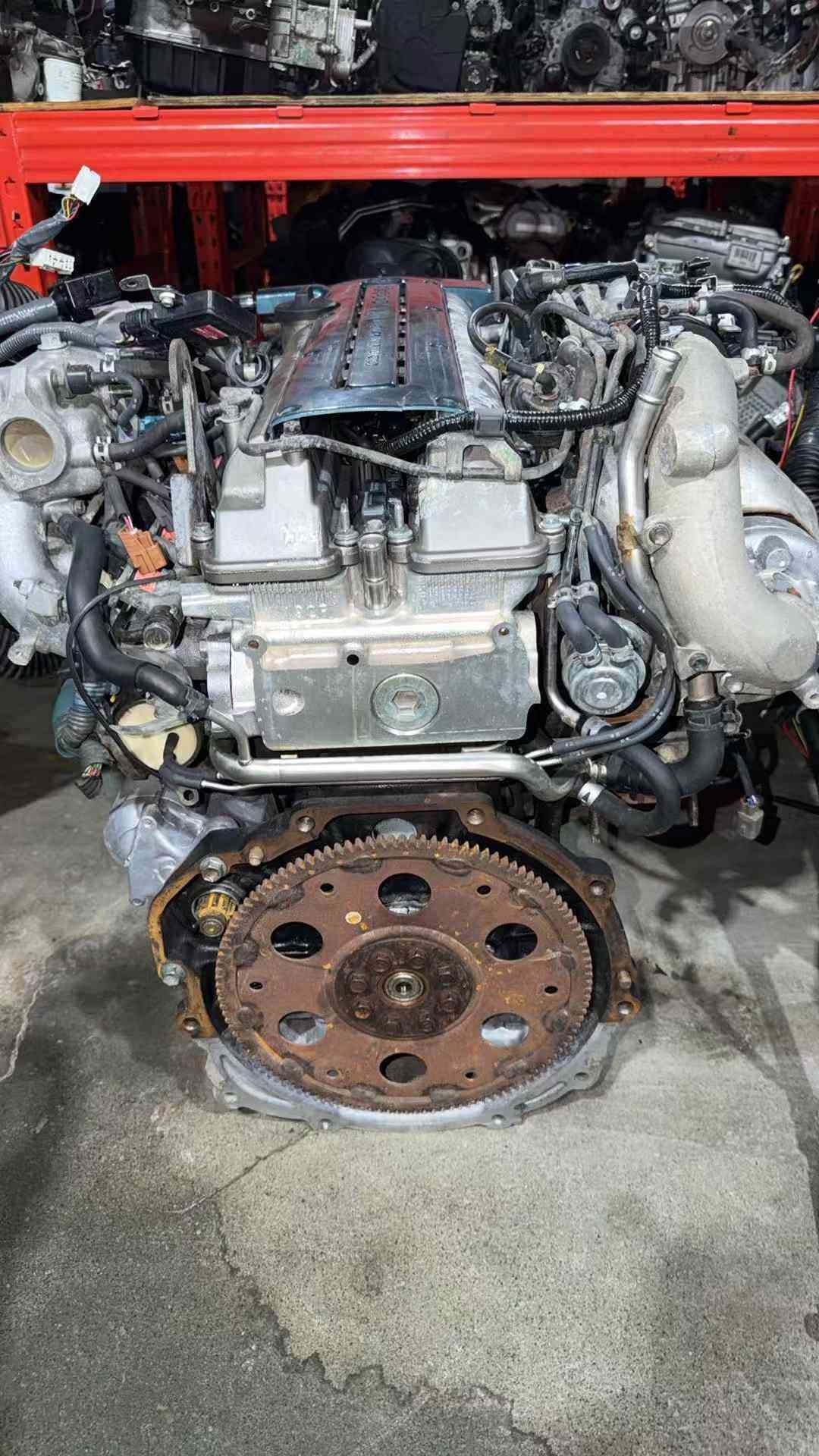Close up of Toyota 2JZ turbo engine intake and manifold