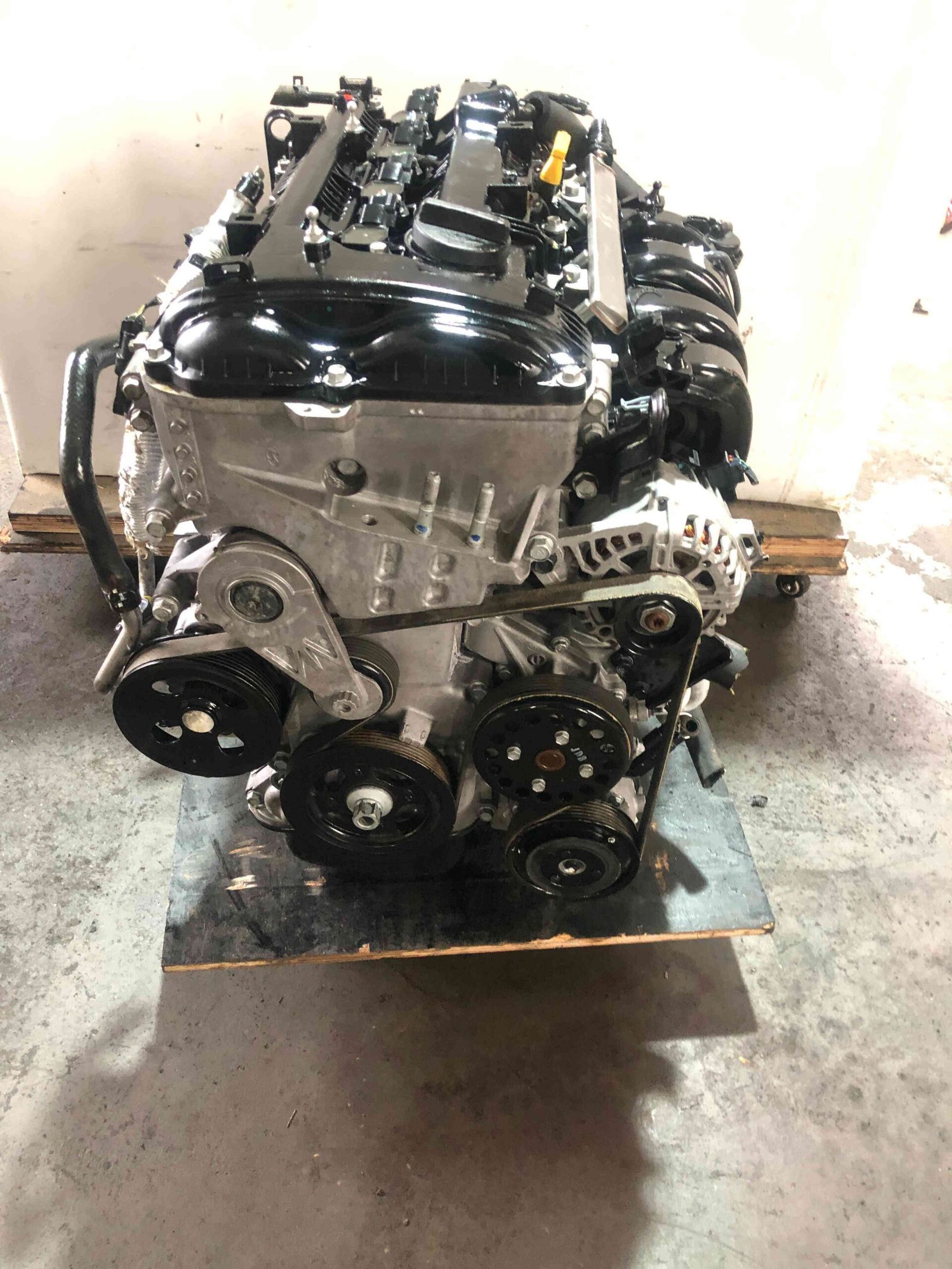 Genuine used Hyundai Elantra 2.0L Nu engine (G4NA) drive belt and pulley side view for sale - accessory belt system