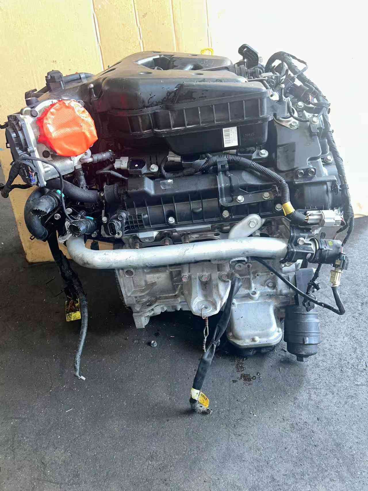 Genuine used Hyundai Genesis 3.3L GDI V6 engine (G6DH) barcode tag side view for sale - labelled used engine with harness