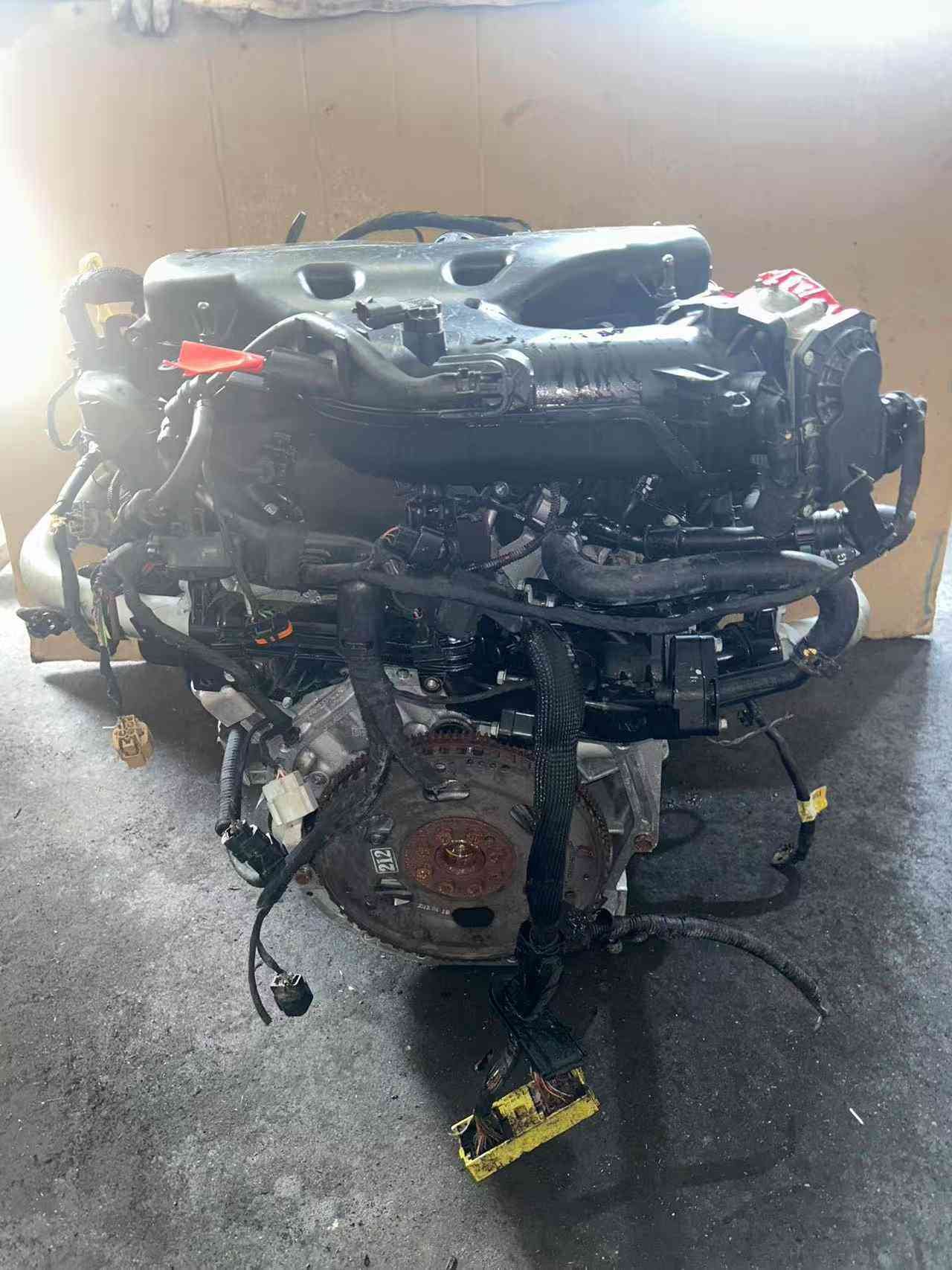 Genuine used Hyundai Genesis 3.3L GDI V6 engine (G6DH) hose side view for sale - complete assembly with red clips and wiring