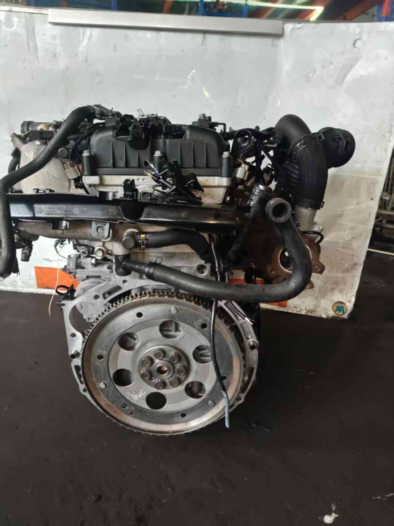 Genuine used Hyundai Genesis Coupe 2.0L turbo engine (G4KF) flywheel end view for sale - flywheel disc and front assembly