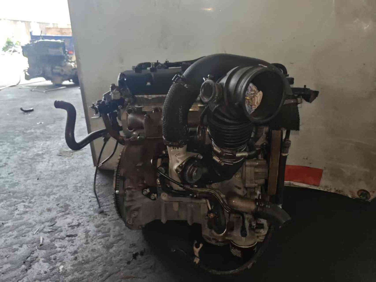 Genuine used Hyundai Genesis Coupe 2.0L turbo engine (G4KF) intake manifold side view for sale