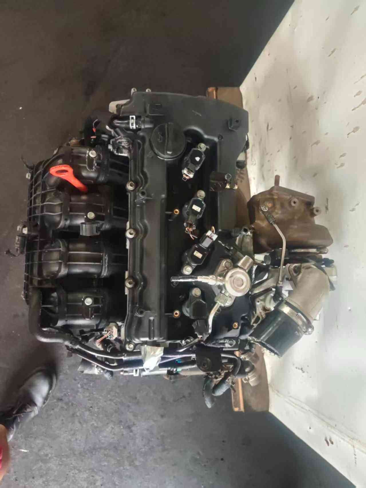 Genuine used Hyundai Sonata 2.0L turbo GDI engine (G4KH) dipstick and harness side view for sale - orange dipstick ring and engine wiring