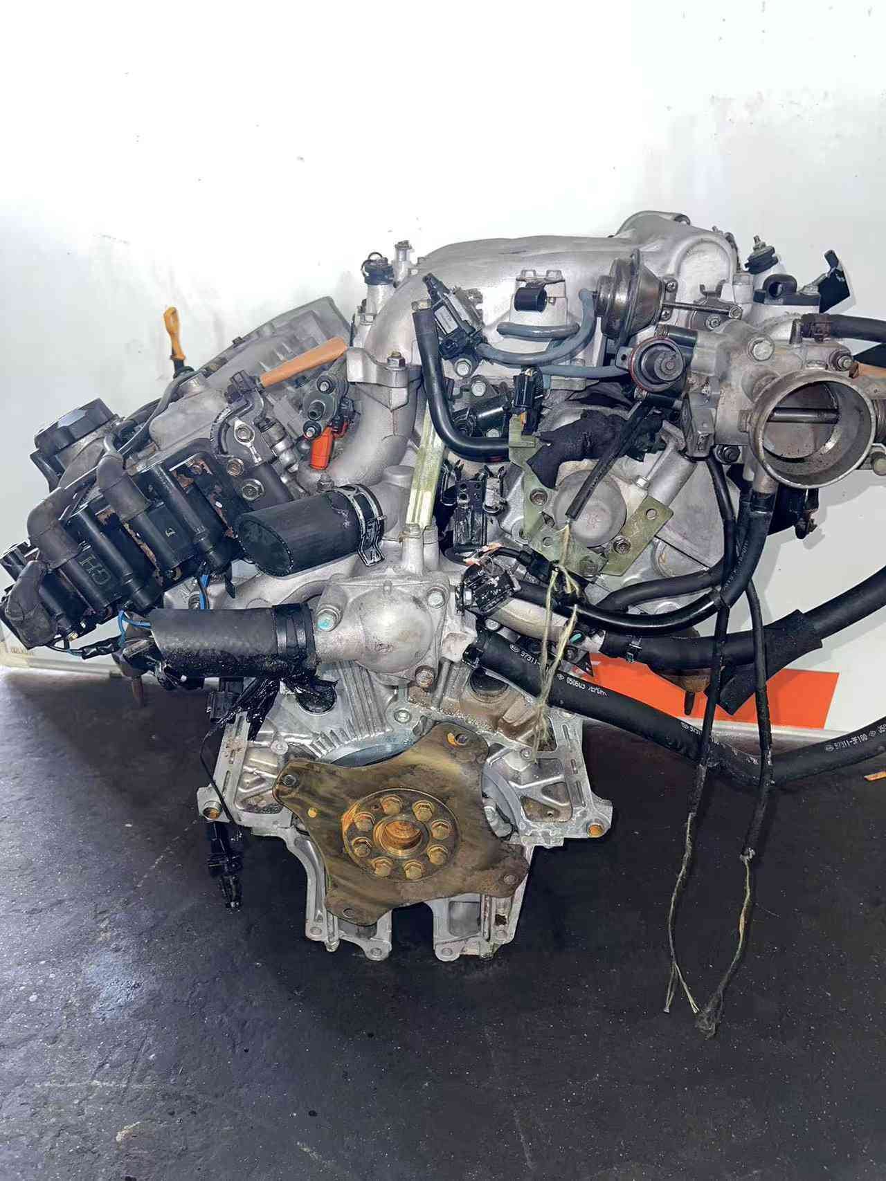 Genuine used Hyundai Sonata 2.7L V6 engine (G6BA) harness and hose side view for sale - complete assembly wiring
