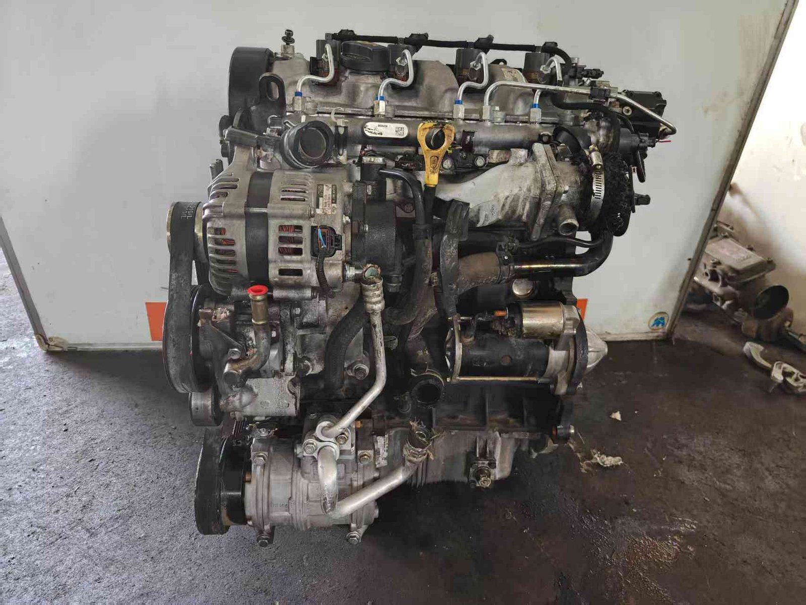 Genuine used Hyundai Tucson 2.0L CRDi diesel engine complete assembly (D4EA) front view for sale - Bosch-labelled common rail diesel engine