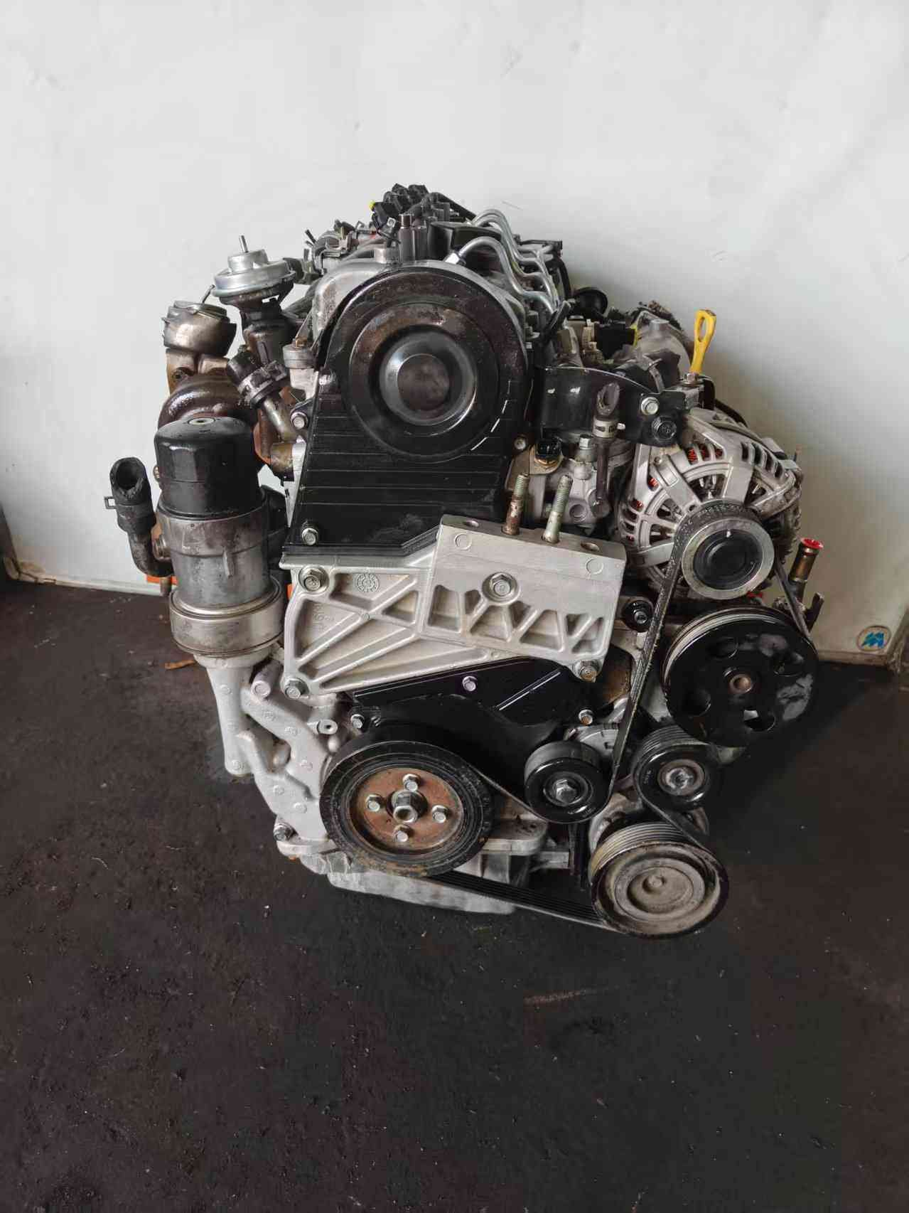 Genuine used Hyundai Tucson 2.0L CRDi diesel engine (D4EA) timing cover and alternator side view for sale - timing cover, pulleys and turbo end