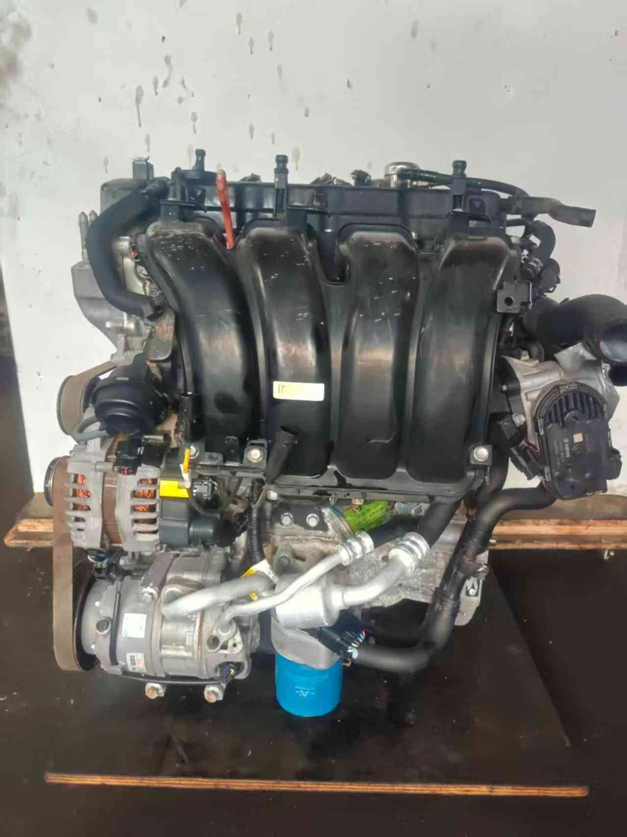 Genuine used Kia Optima 2.4L GDI engine (G4KJ) intake and alternator side view for sale - intake manifold, alternator and oil filter