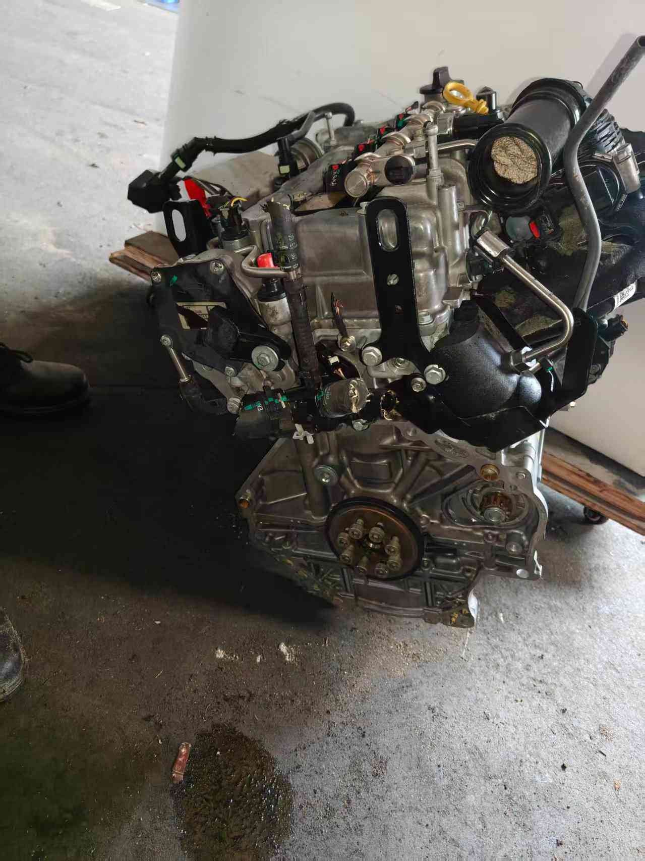 Identifying the various sensor locations on an MG ZS Turbo LE2 engine assembly.