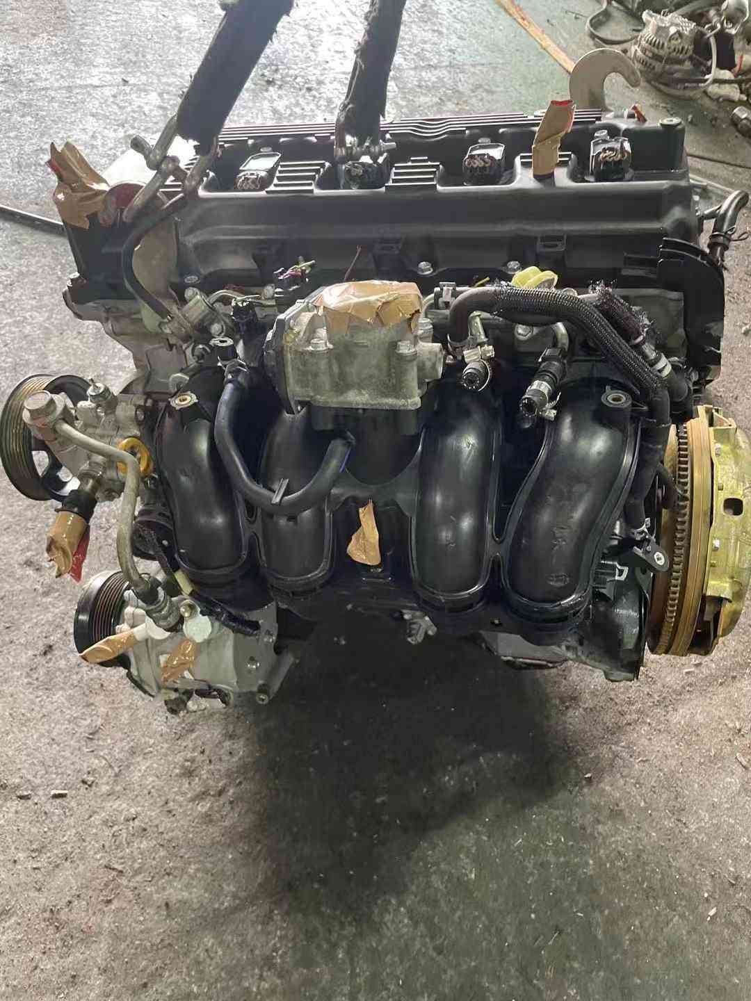 Toyota 1TR engine rear angle with accessories