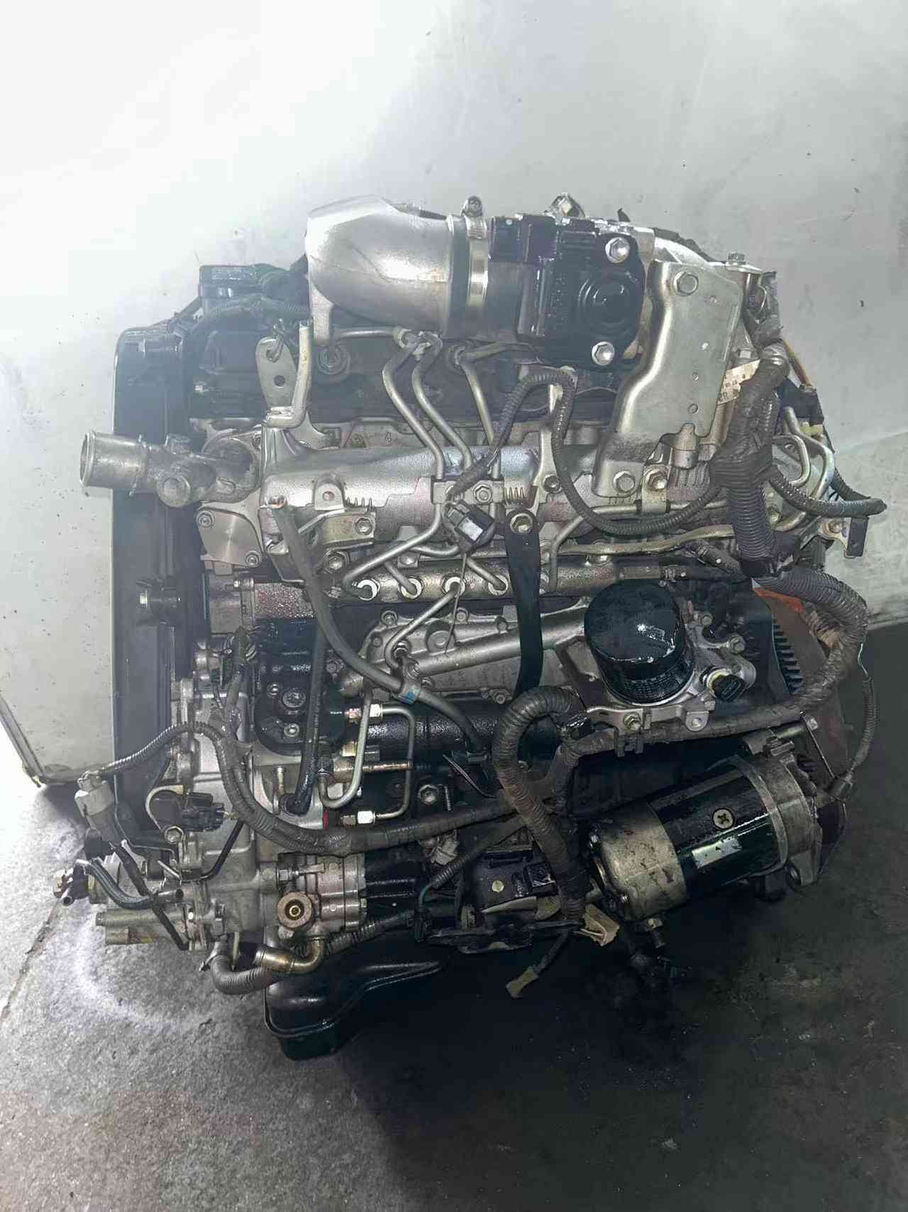 Toyota 2KD diesel engine rear view with pump