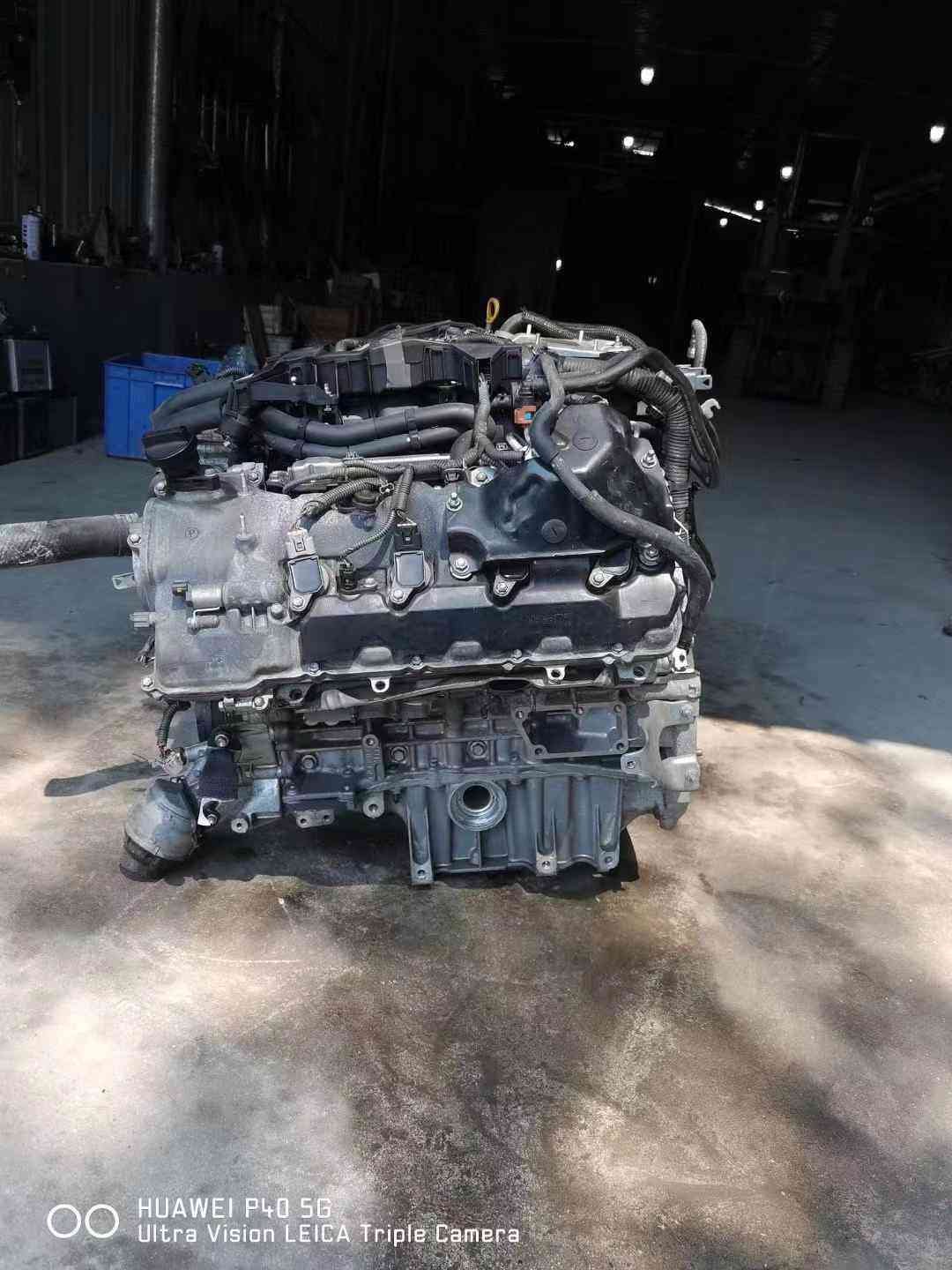 Toyota 2UR V8 engine rear view with wiring harness