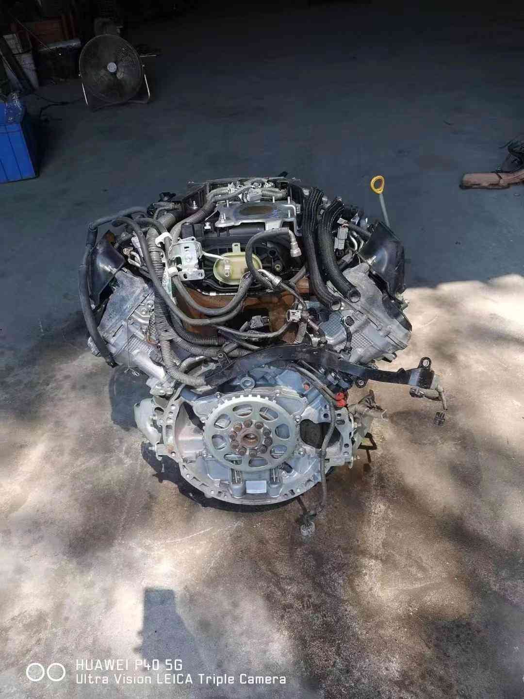 Toyota 2UR engine accessory parts close-up