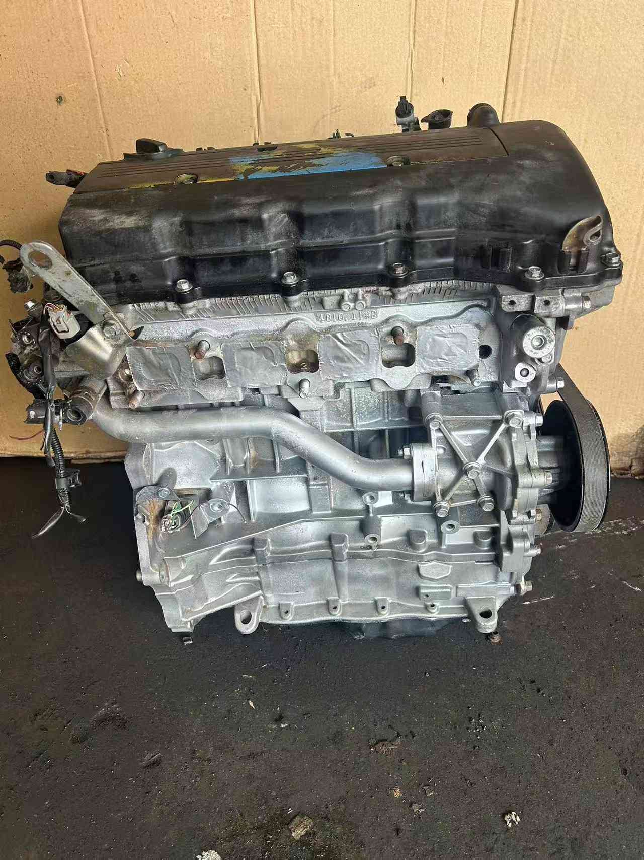 Inspected second-hand Mitsubishi 4B10 engine unit ready for shipping.