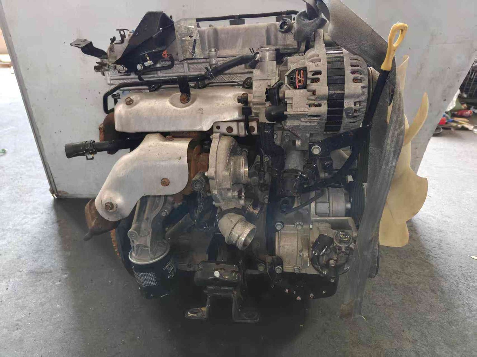 Hyundai Kia D4HB used engine side view showing turbocharger and engine block