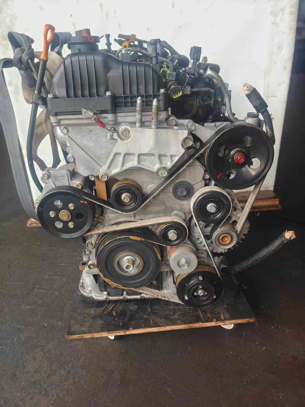 Hyundai Kia D4HB used engine front view with serpentine belt, pulleys and alternator