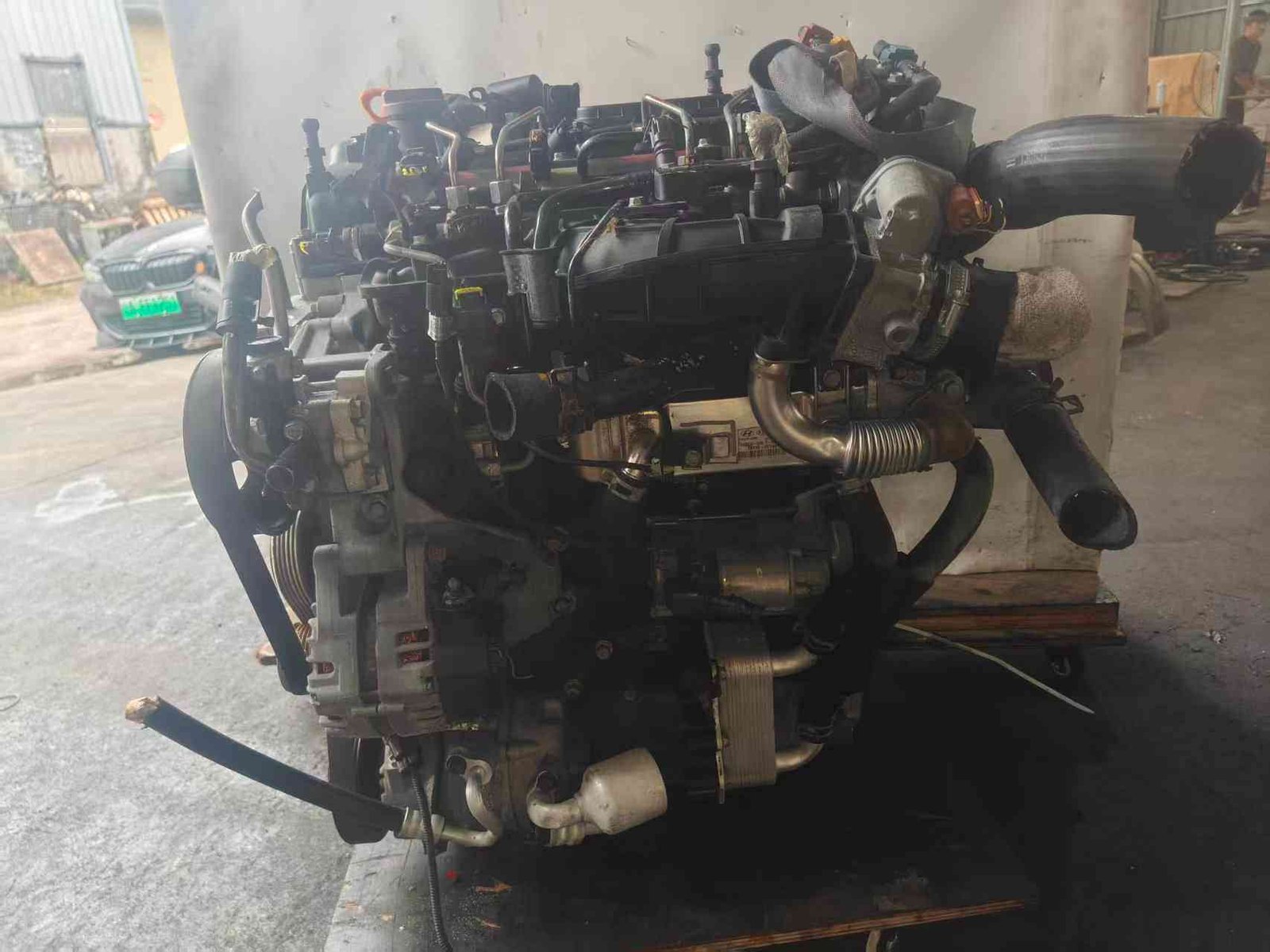 Hyundai Kia D4HB used engine side view with EGR pipe, intake system and alternator