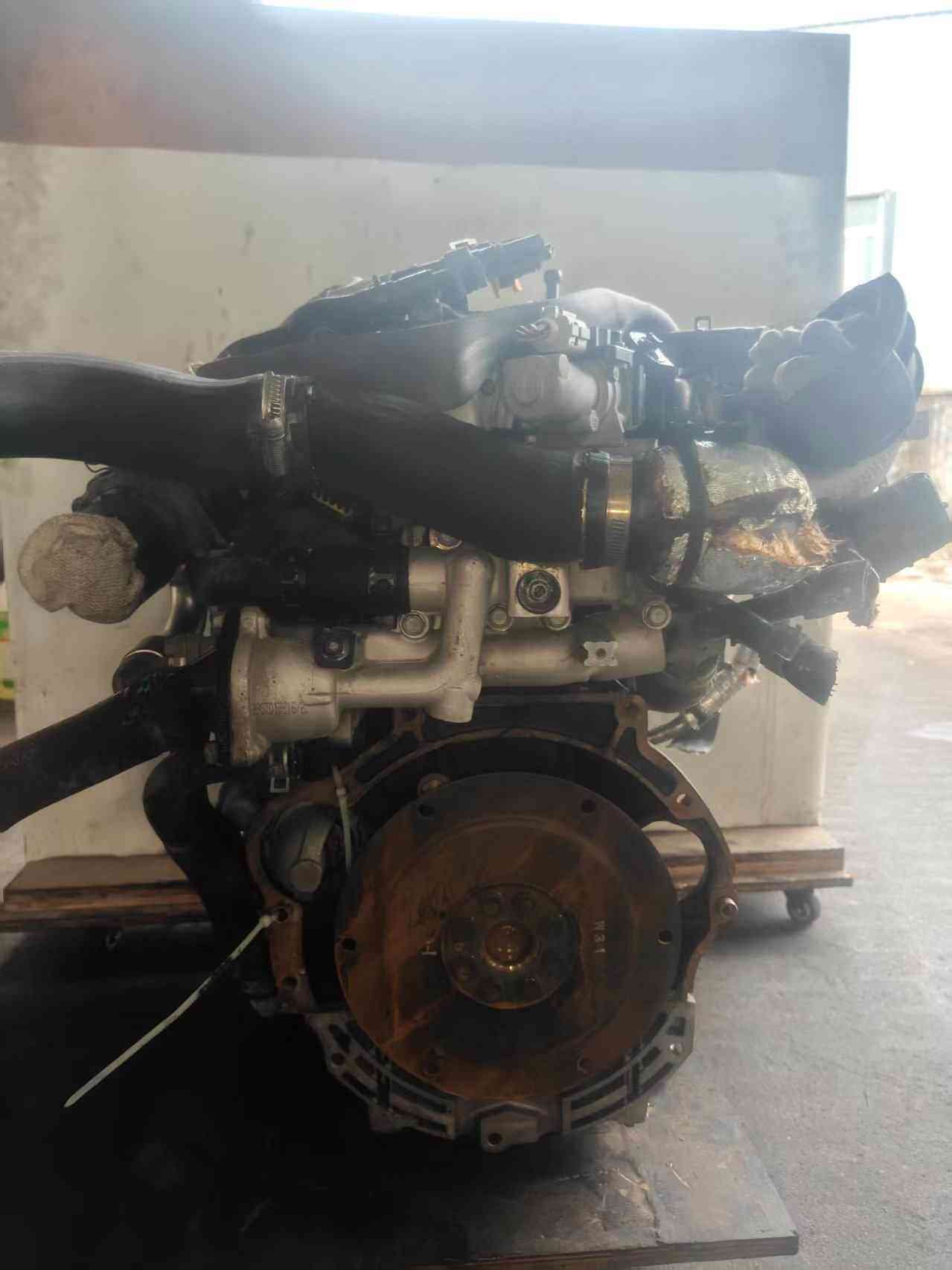 Hyundai Kia D4HB used engine rear view with flywheel and intake components