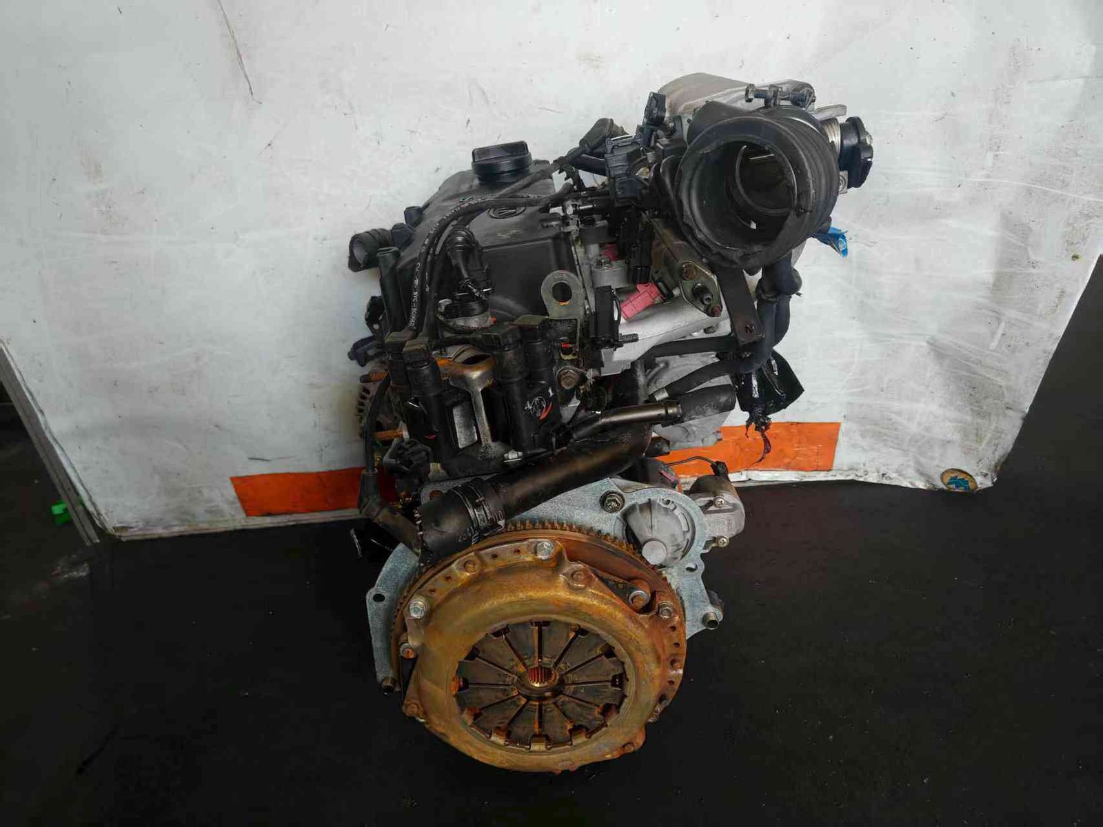 Hyundai Kia G4EA used engine rear view showing clutch assembly and intake components